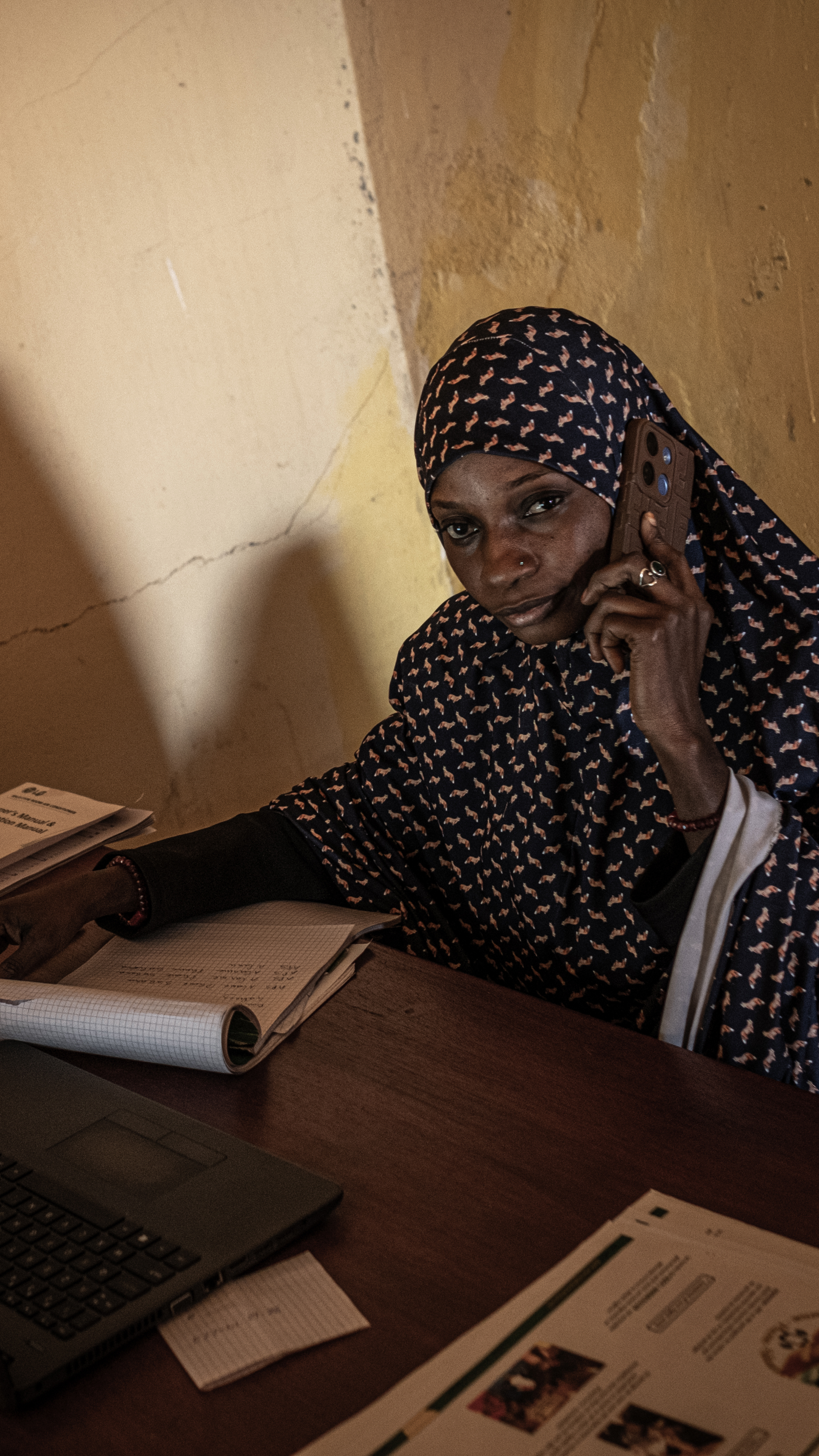 Bamira Hassane answers calls for NGO Alarm Phone Sahara's emergency hotline