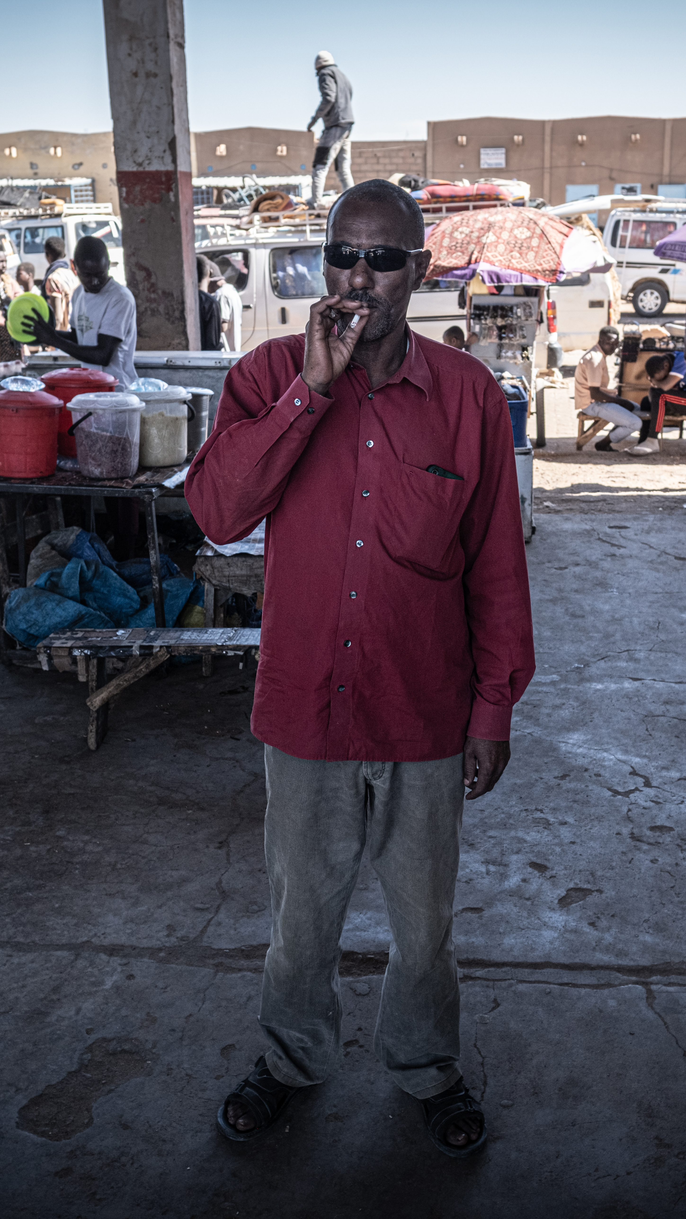 The old bus station in Agadez is like a second home to experienced passeur Abdou Amma [Marco Simoncelli/ Al Jazeera]