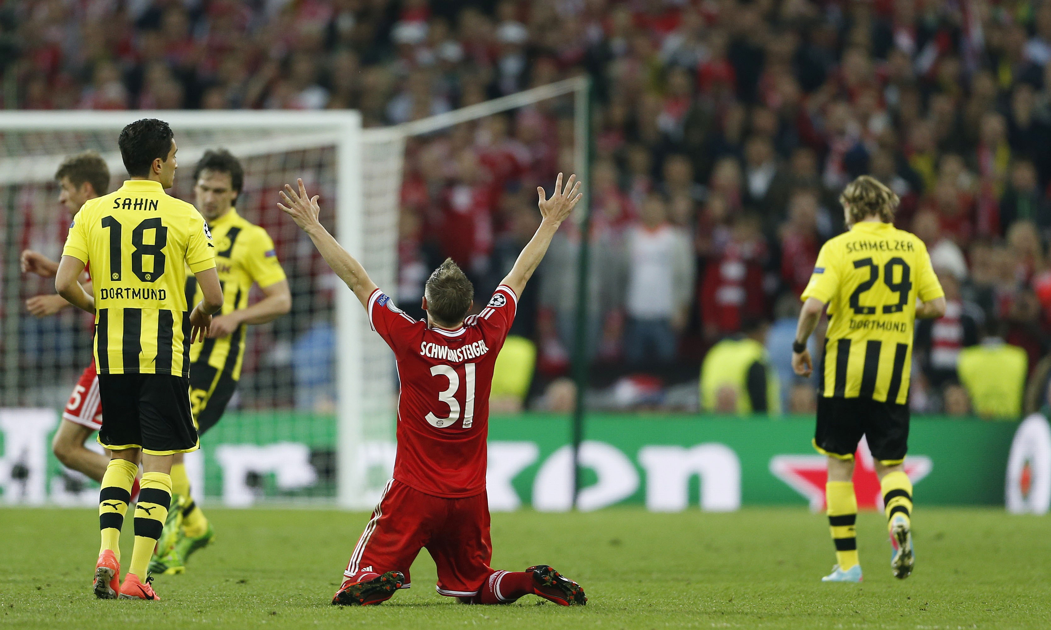 Bayern Munich's Bastian Schweinsteiger celebrates at the end of the match