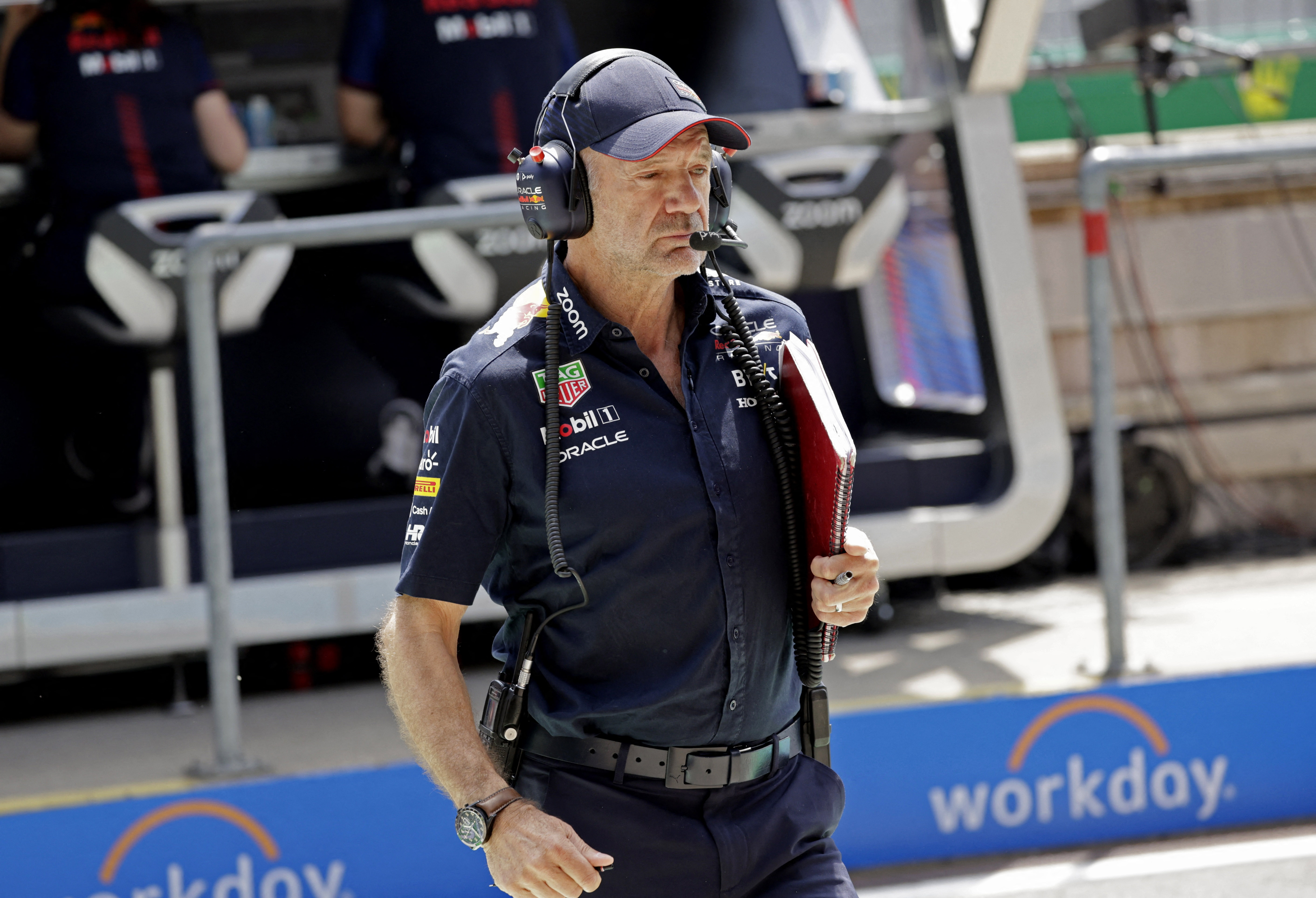 Adrian Newey walking in pit lane.