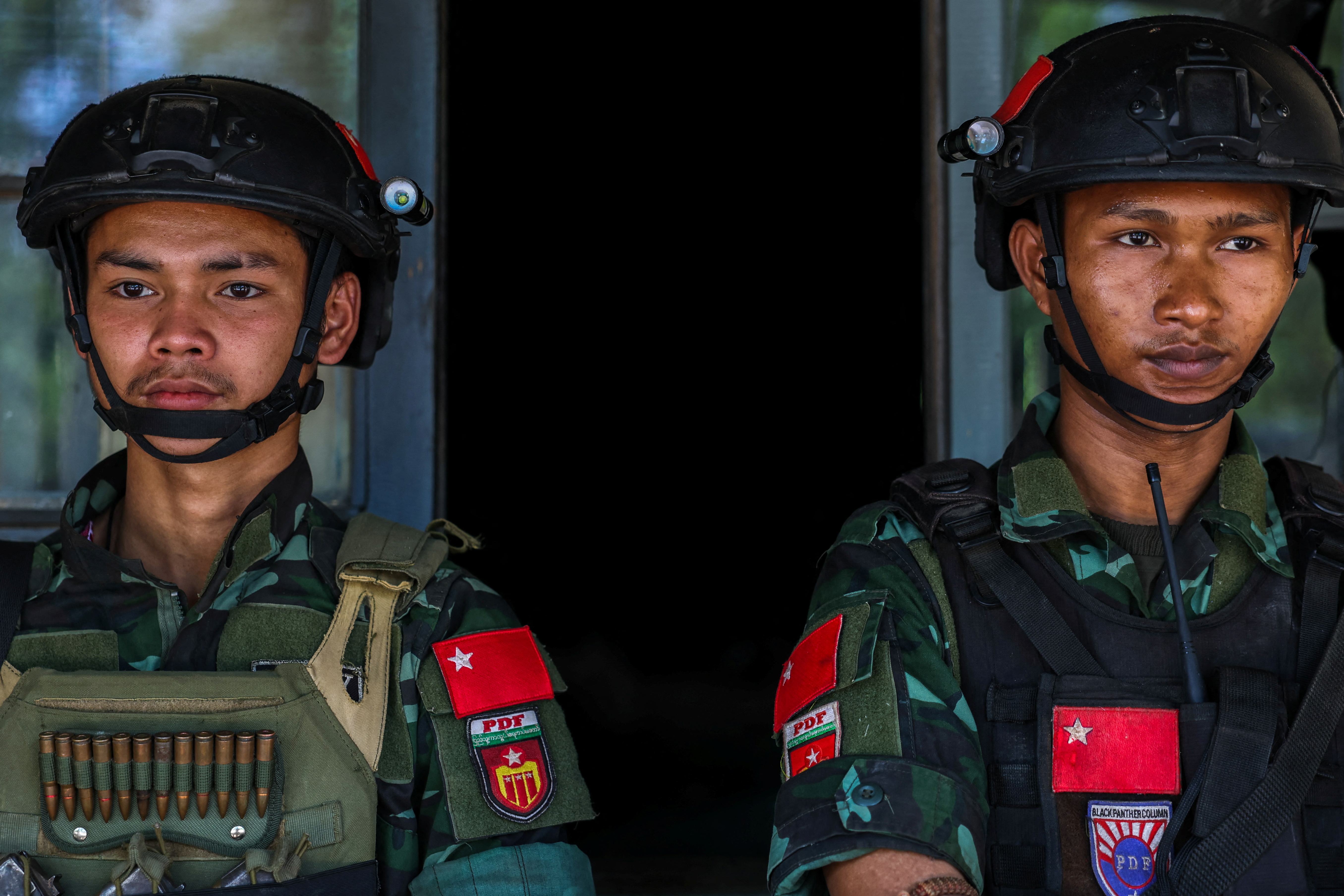 Soldiers from a PDF unit. They are standing guard outside a building,