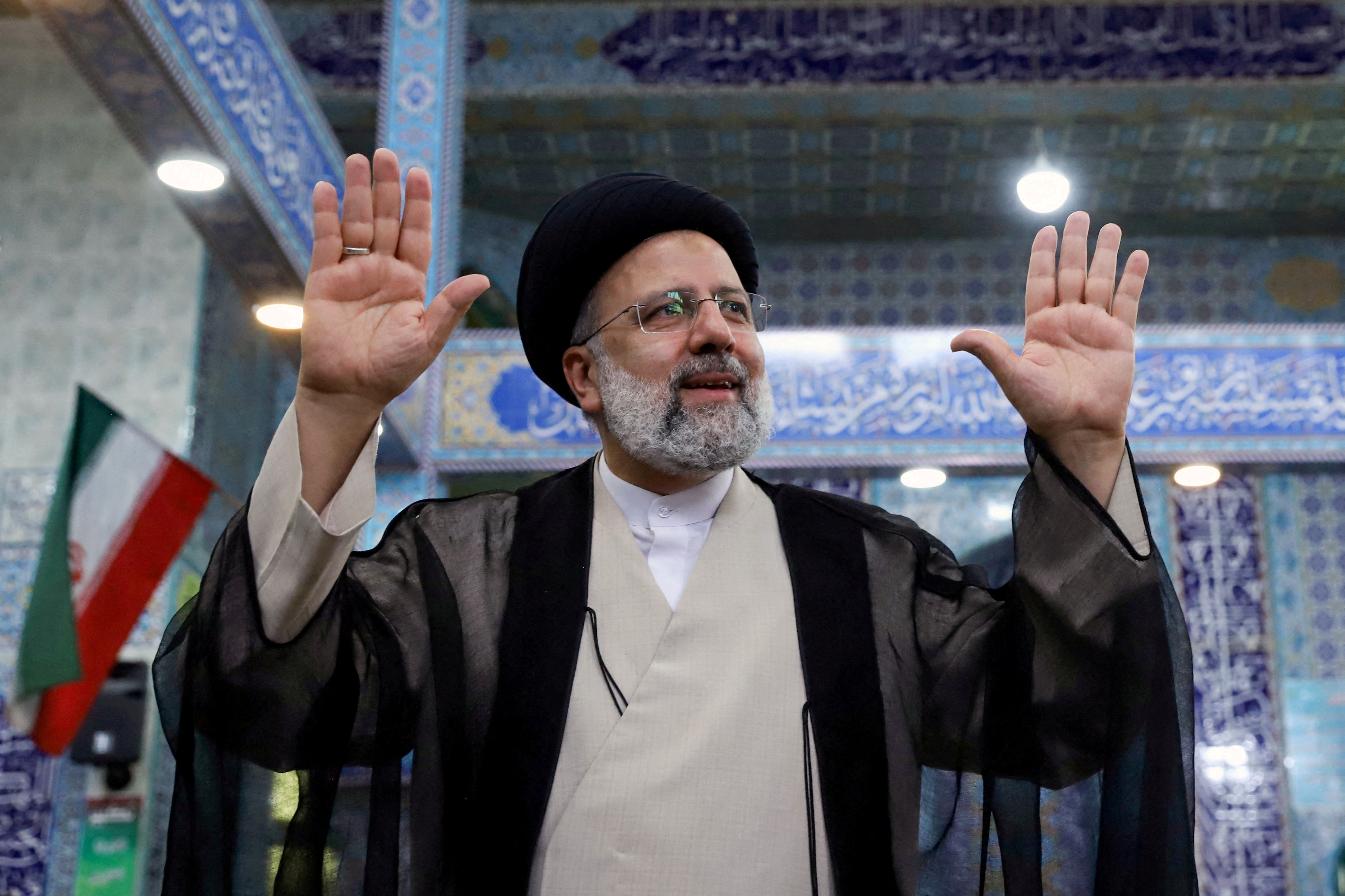 FILE PHOTO: Presidential candidate Ebrahim Raisi gestures after casting his vote during presidential elections at a polling station in Tehran, Iran June 18, 2021. Majid Asgaripour/WANA (West Asia News Agency) via REUTERS/File Photo ATTENTION EDITORS - THIS IMAGE HAS BEEN SUPPLIED BY A THIRD PARTY