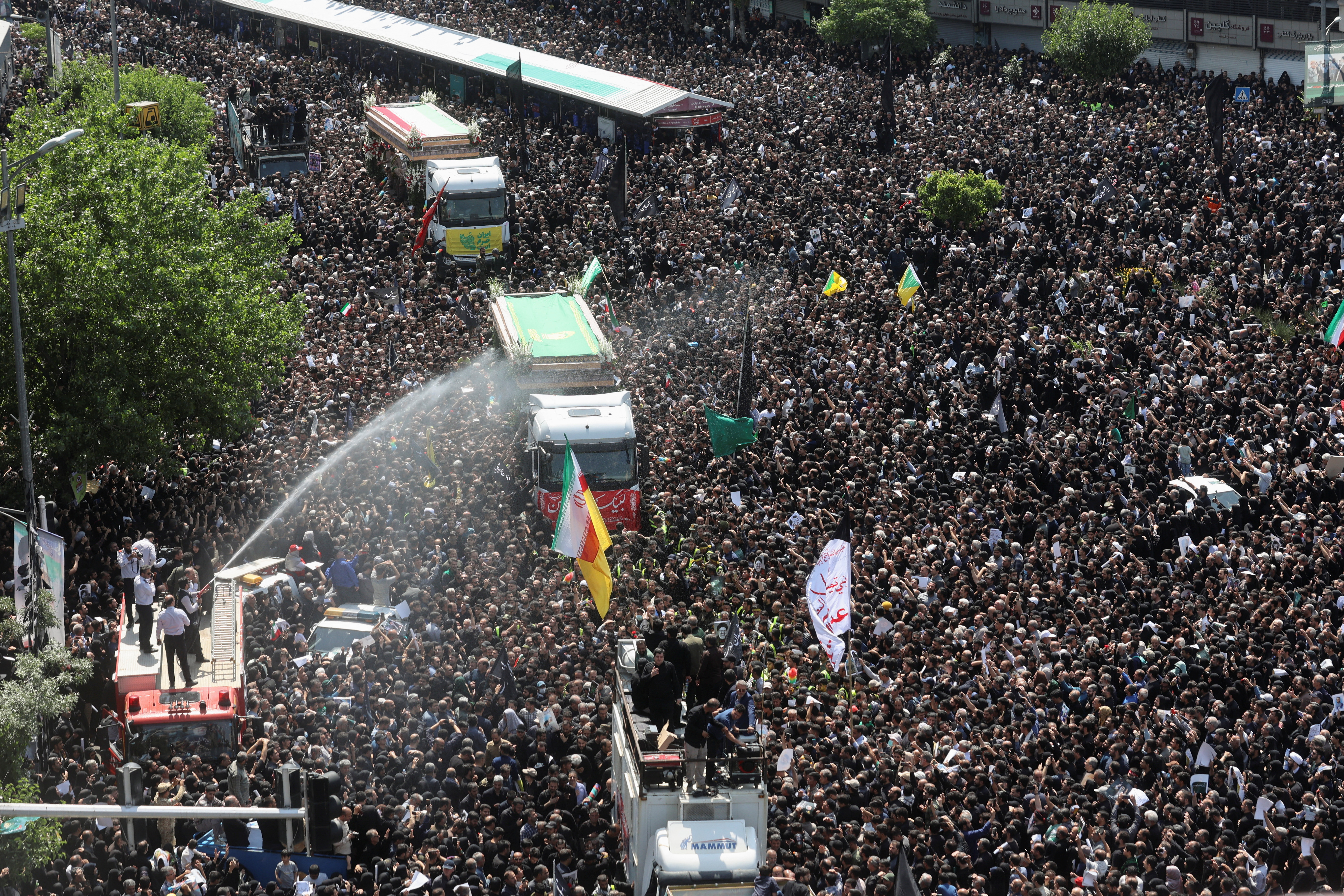 Mourners attend the funeral of Iranian President Ebrahim Raisi,