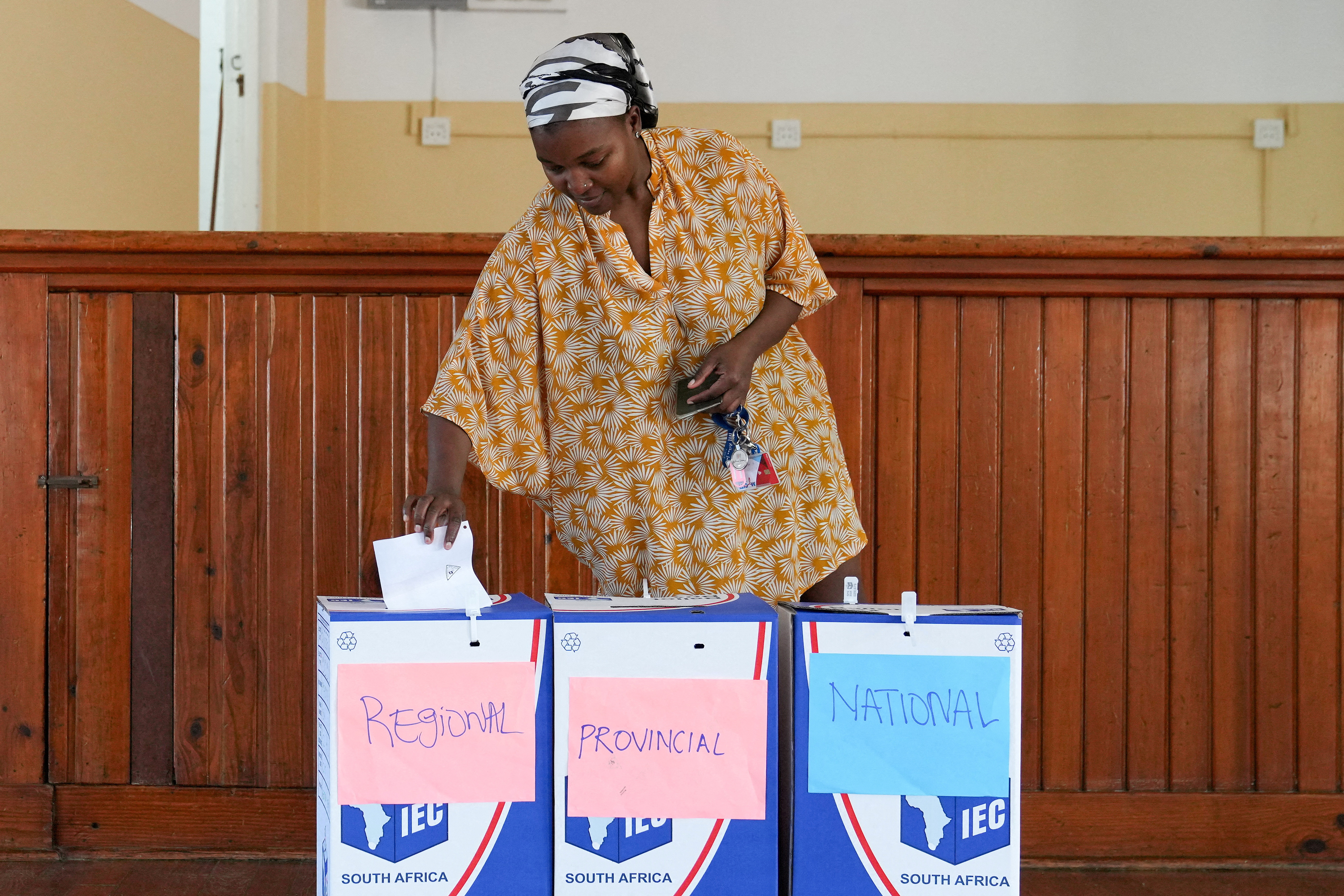A woman votes during the South African elections, on Robben Island, the prison off the coast of Cape Town where Nelson Mandela and many other political prisoners were kept during the rule of the Apartheid regime