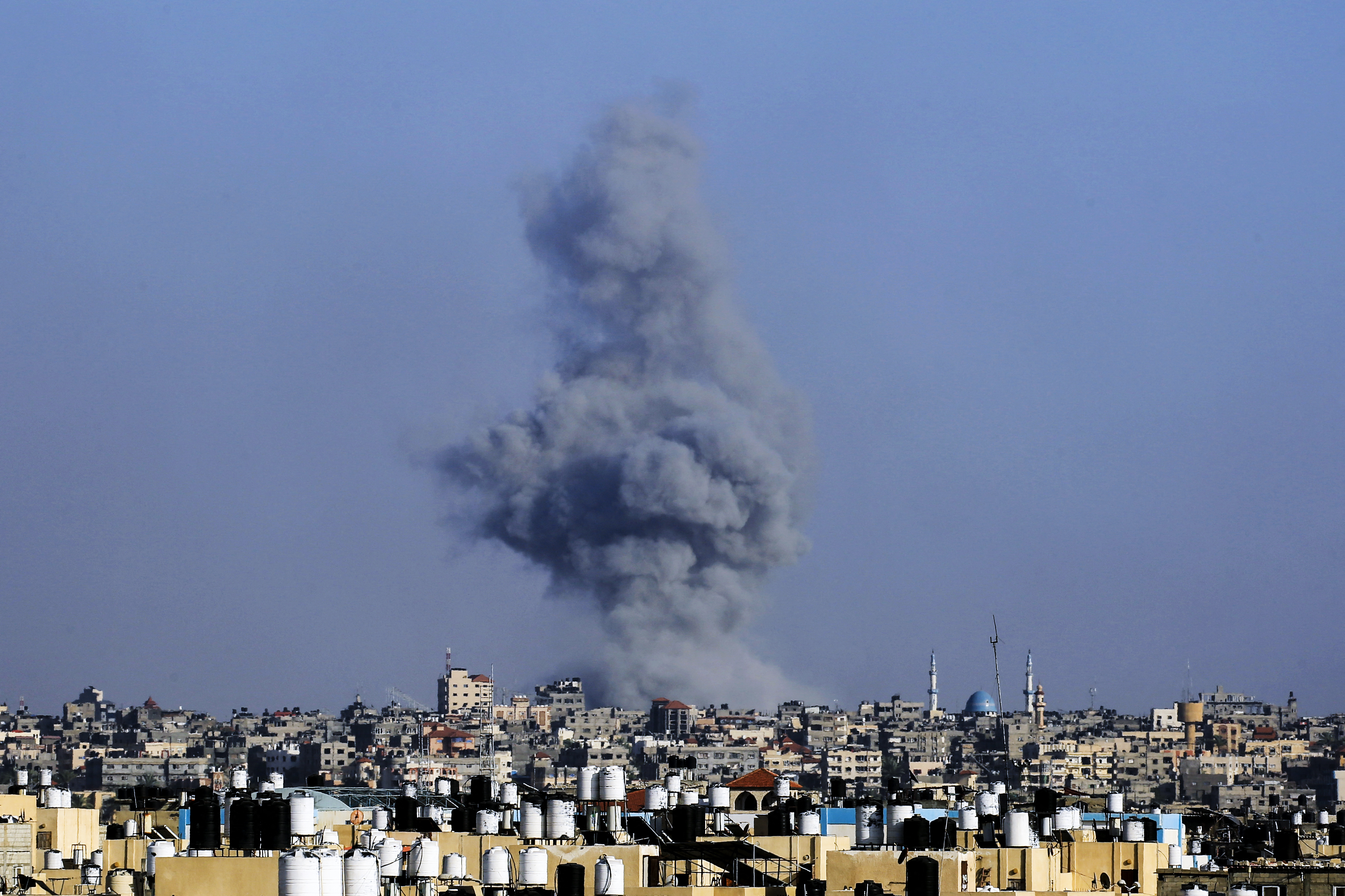 Smoke billows following Israeli bombardment in Rafah, in the southern Gaza Strip, on May 25
