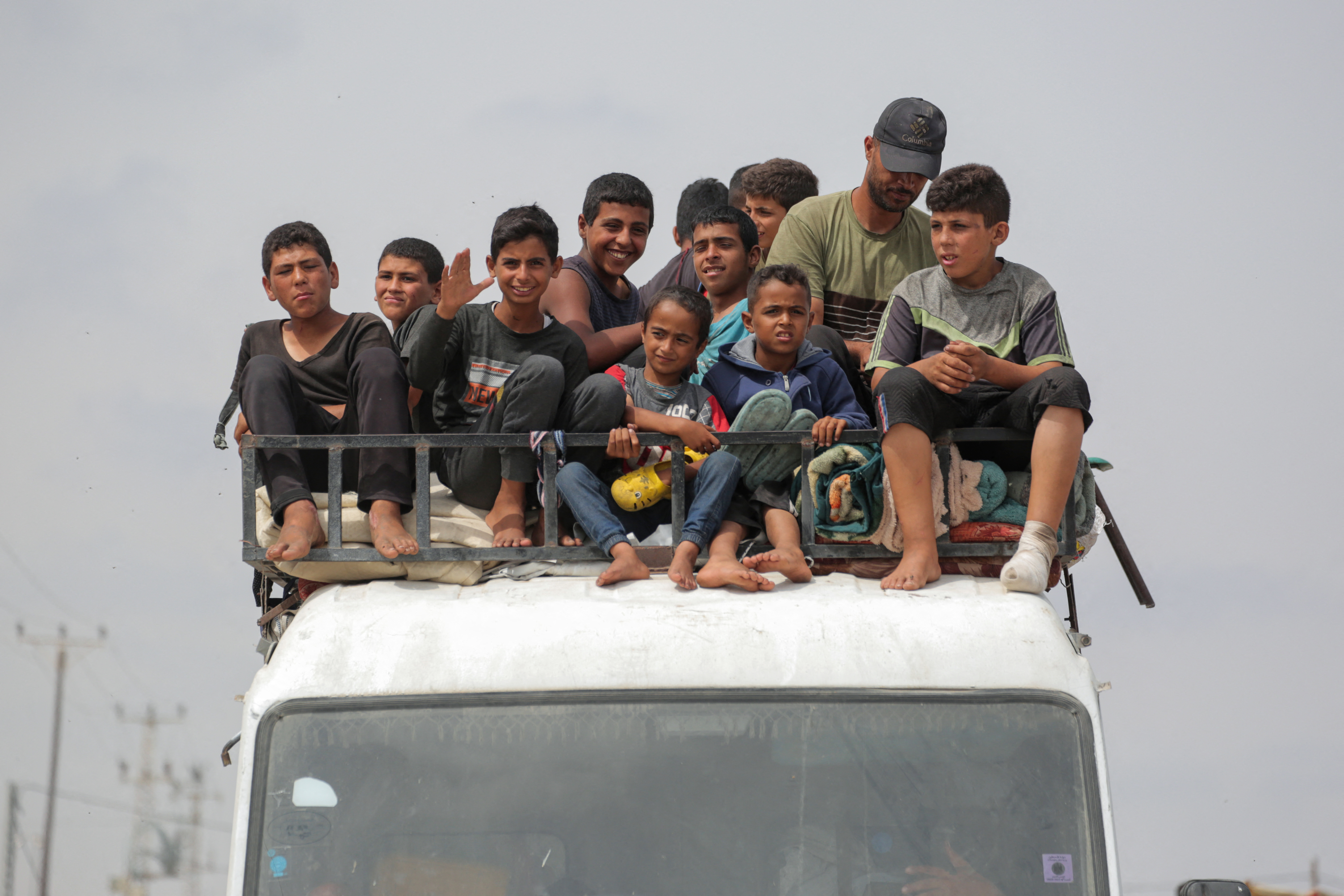 Palestinians flee the area of Tal al-Sultan in Rafah