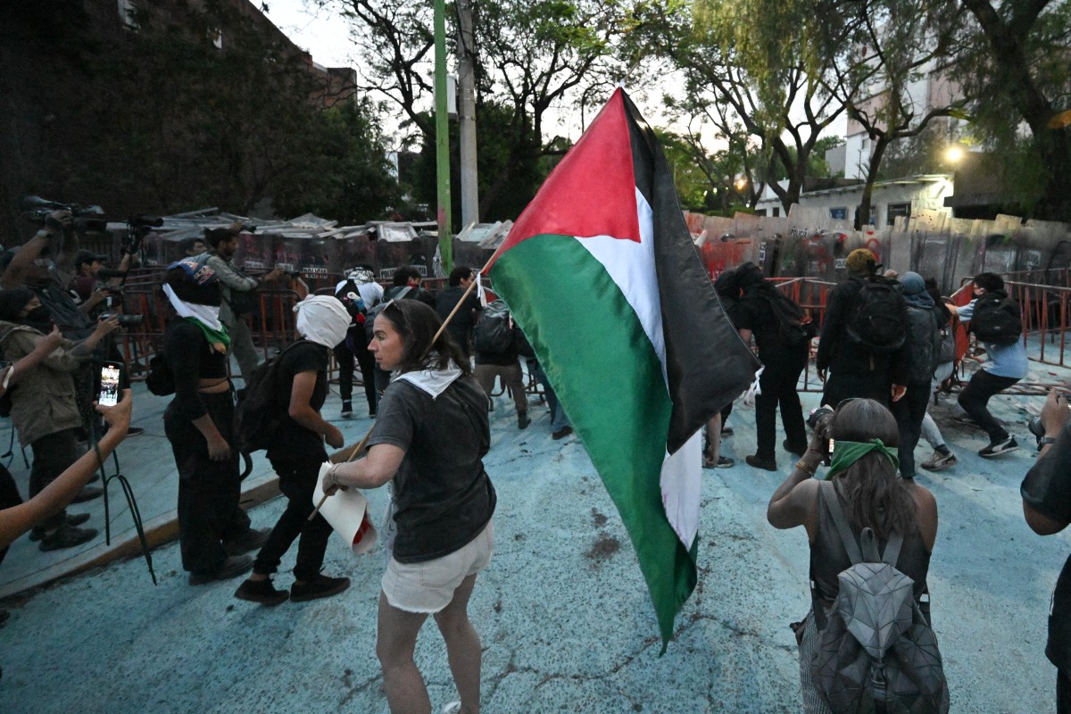 Demonstrators clash with the police during a pro-Palestinian rally called "Urgent action for Rafah"