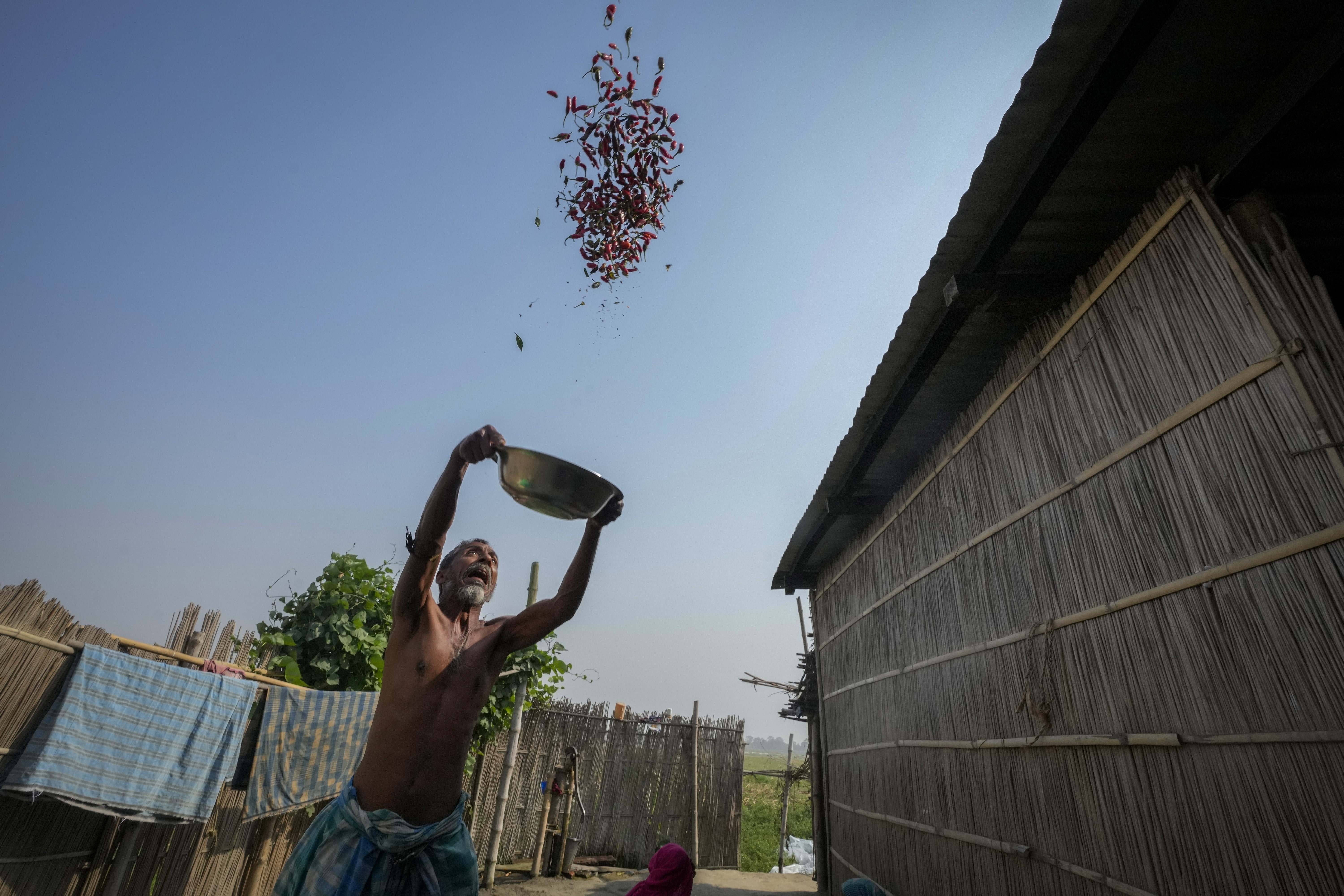 India's river islanders return home in between floods