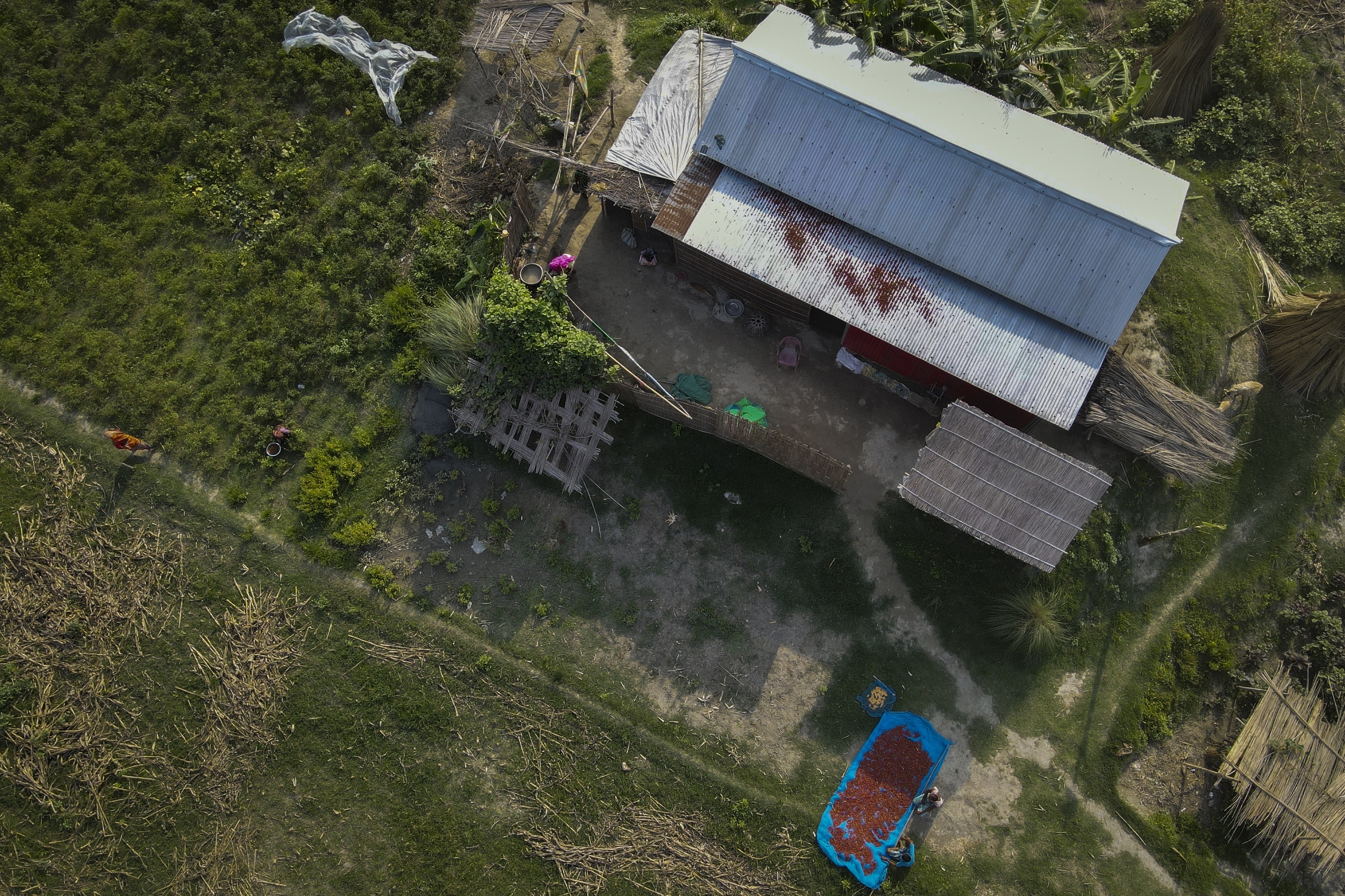 India's river islanders return home in between floods