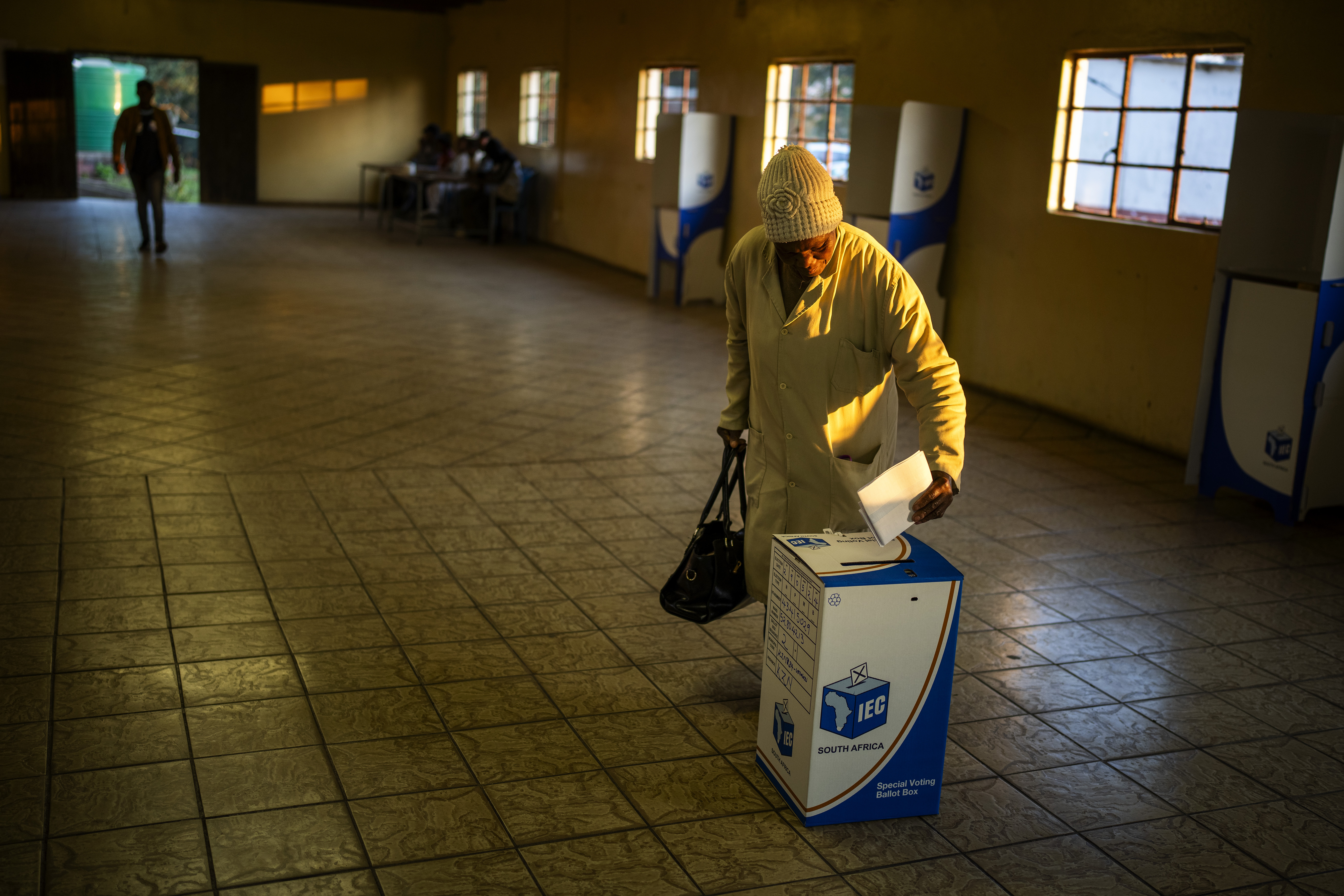 A woman casts her ballot on Wednesday May 29, 2024, during general elections in KwaMfana, South Africa