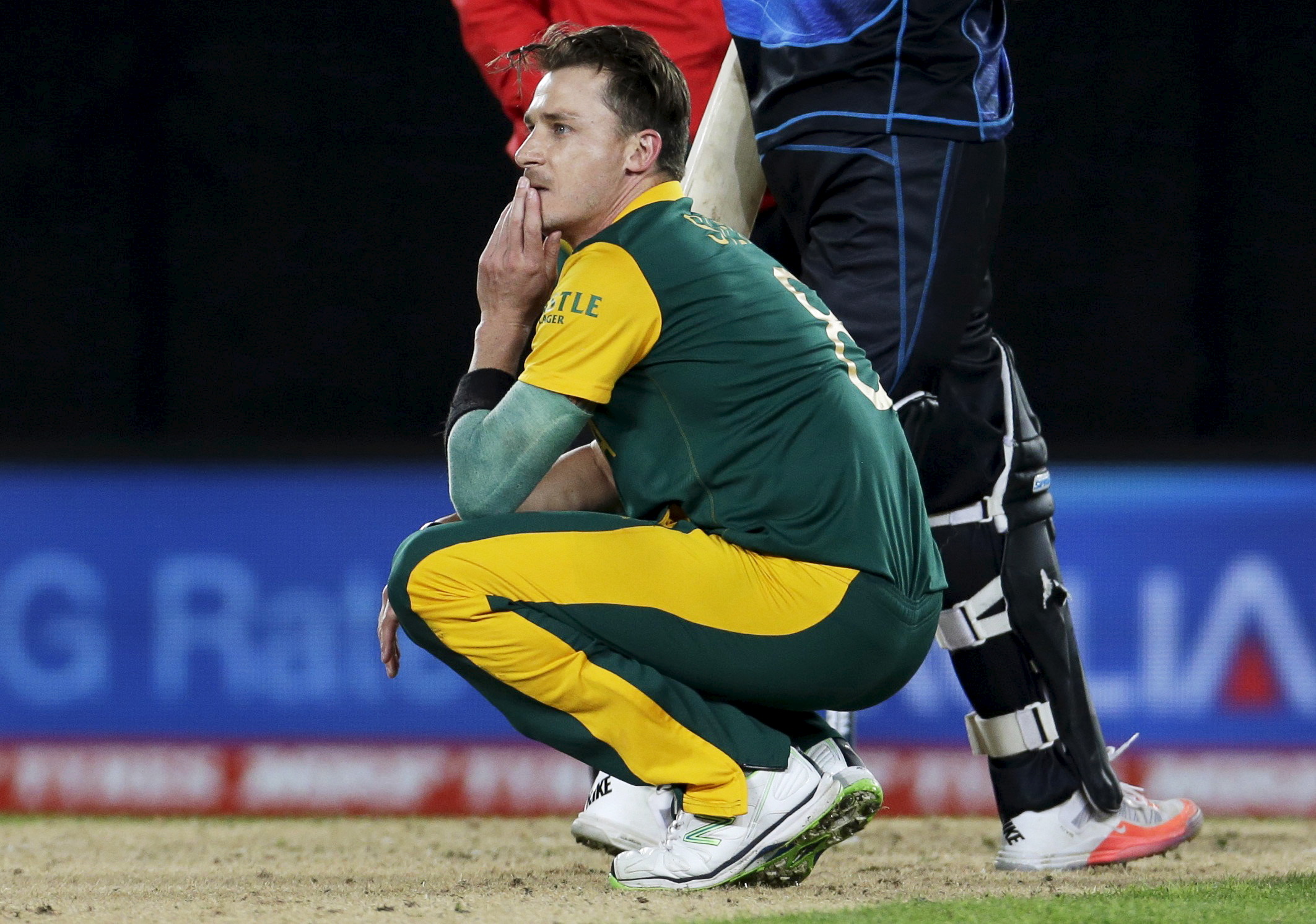 South Africa's bowler Dale Steyn reacts on the pitch after New Zealand's Grant Elliot hit a shot for six runs to win their Cricket World Cup semi-final match against South Africa in Auckland, March 24, 2015. REUTERS/Anthony Phelps