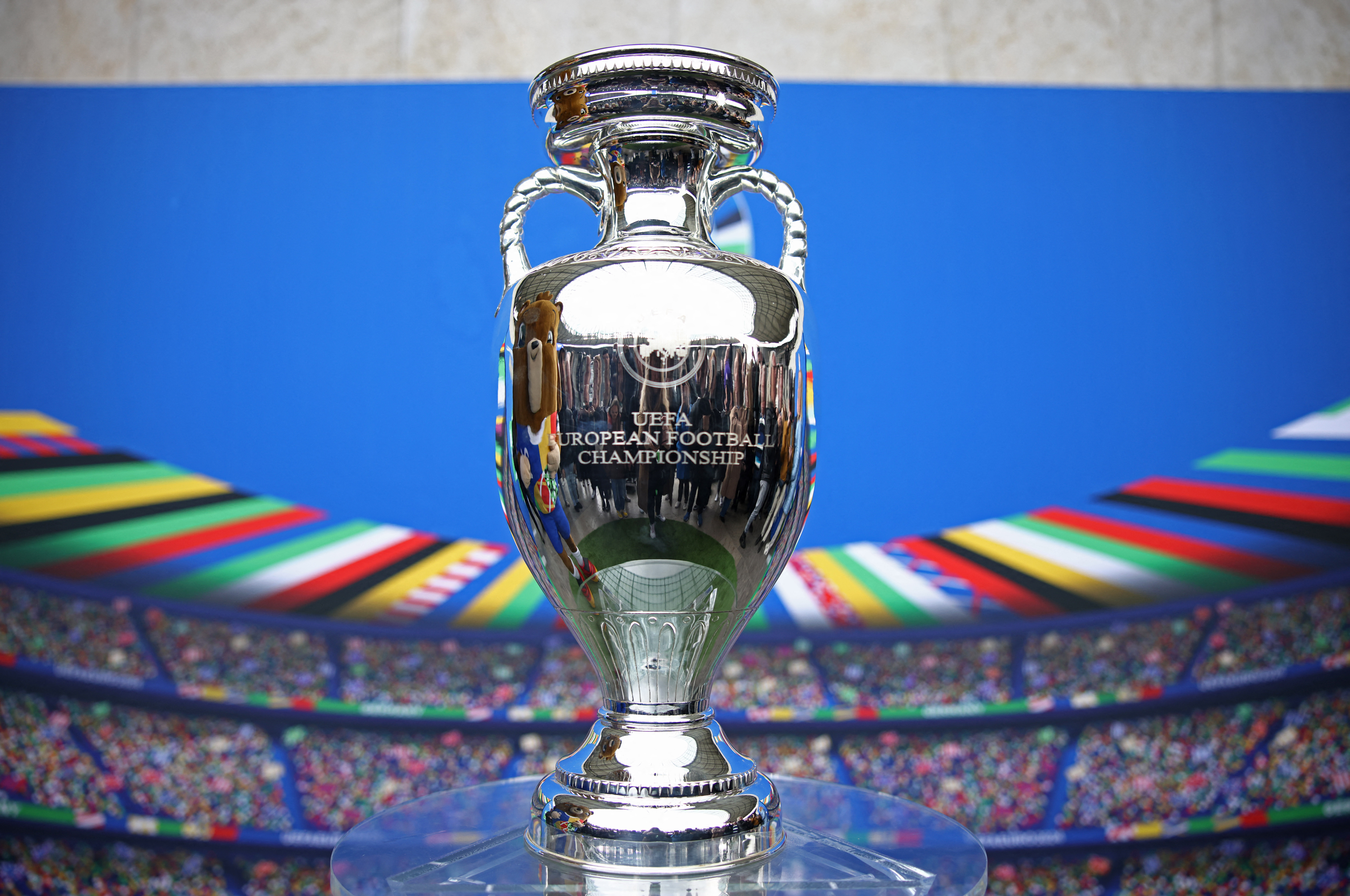 Trophy on display at football stadium.