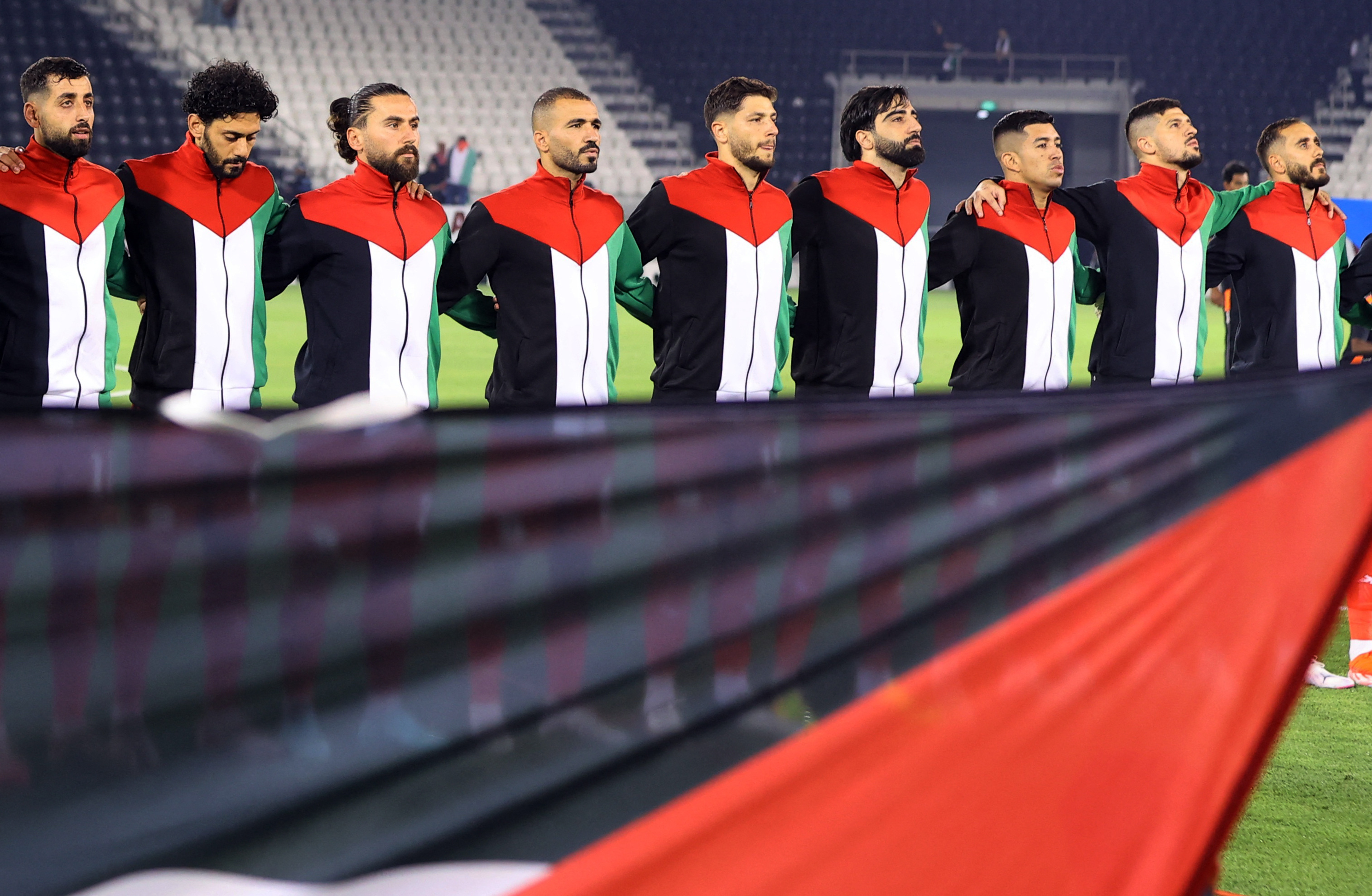 Soccer Football - World Cup - AFC Qualifiers - Palestine v Lebanon - Jassim Bin Hamad Stadium, Doha, Qatar - June 6, 2024 Palestine players line up before the match REUTERS/Ibraheem Al Omari