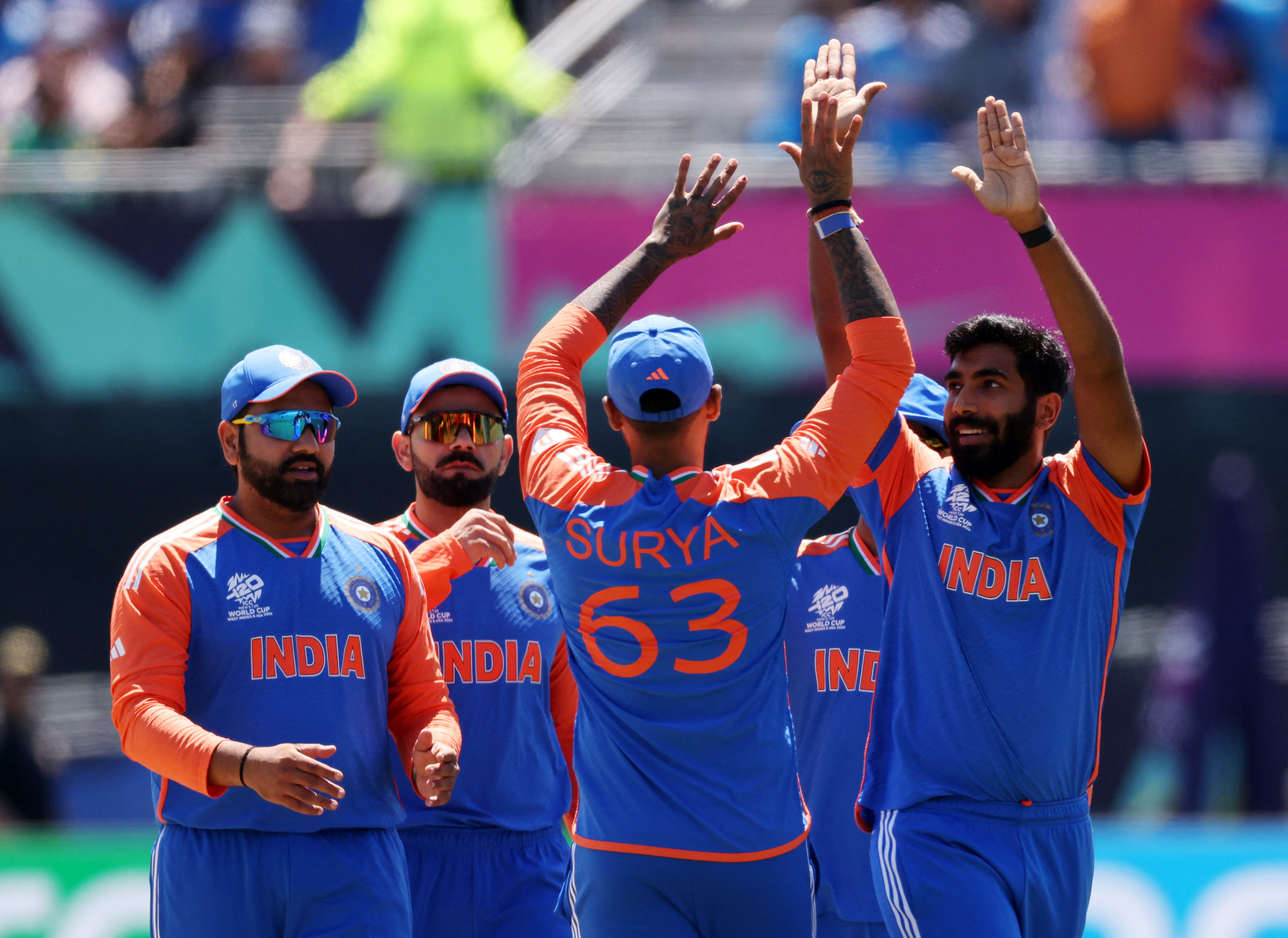 Cricket - ICC T20 World Cup 2024 - Group A - India v Pakistan - Nassau County International Cricket Stadium, New York, United States - June 9, 2024 India's Jasprit Bumrah celebrates with team mates after taking the wicket of Pakistan's Babar Azam REUTERS/Andrew Kelly