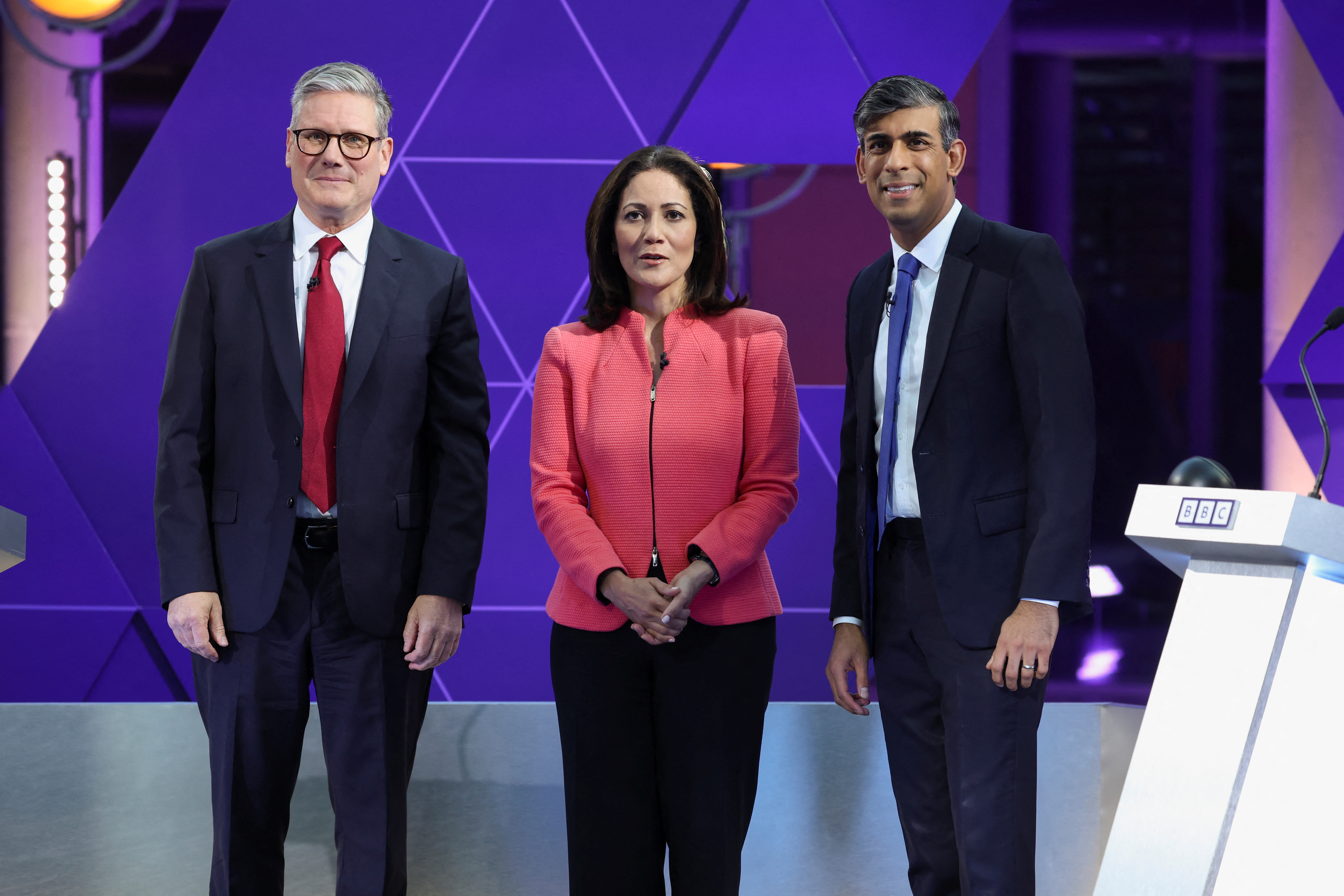 British opposition Labour Party leader Keir Starmer, British Prime Minister Rishi Sunak and Mishal Husain pose on the day of BBC's Prime Ministerial Debate, in Nottingham, Britain
