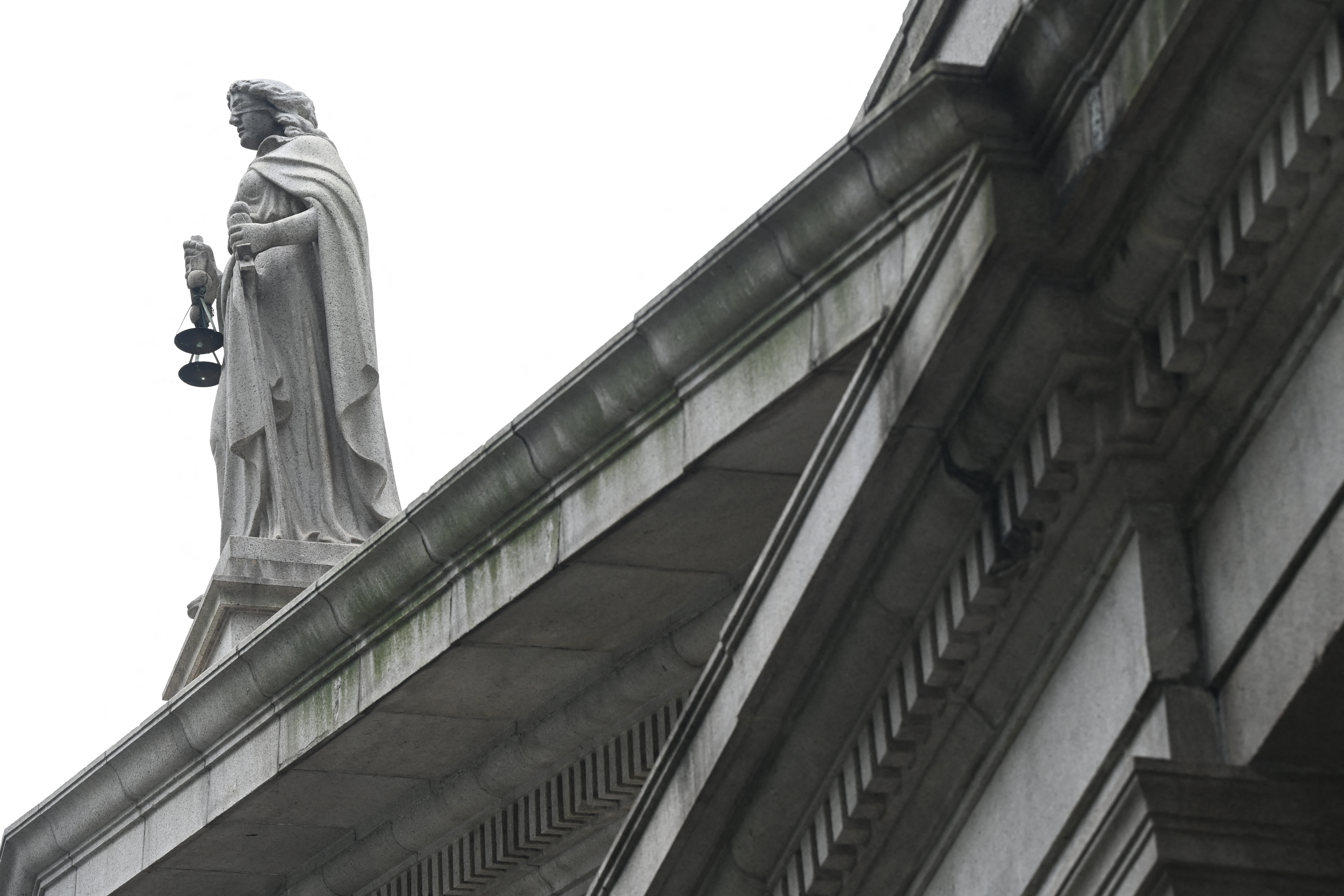 A statue of Lady Justice on the roof of Hong Kong's Court of Final Appeal
