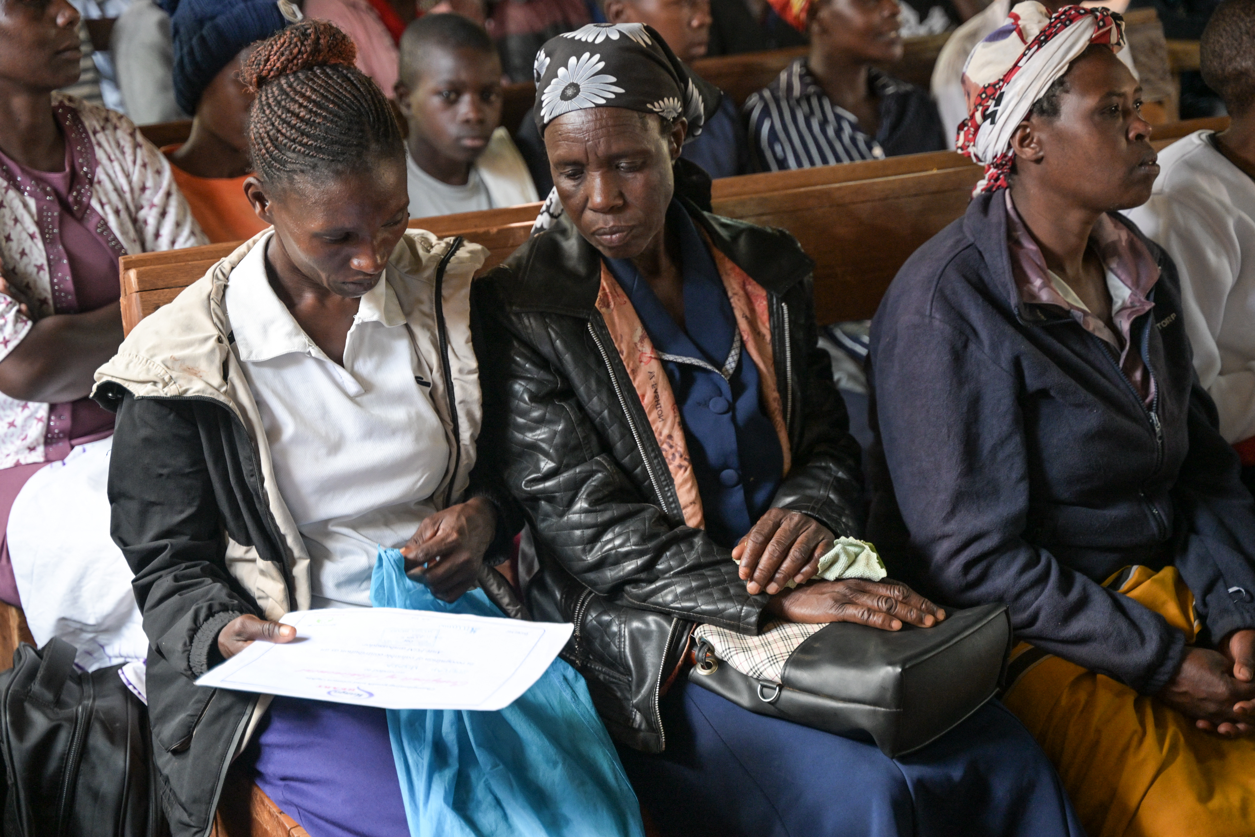 Parents and guardians attend the alternative rite of passage ceremony for girls organised by Manga HEART, a non-profit fighting gender-based violence and female genital mutilation (FGM) in Kenya