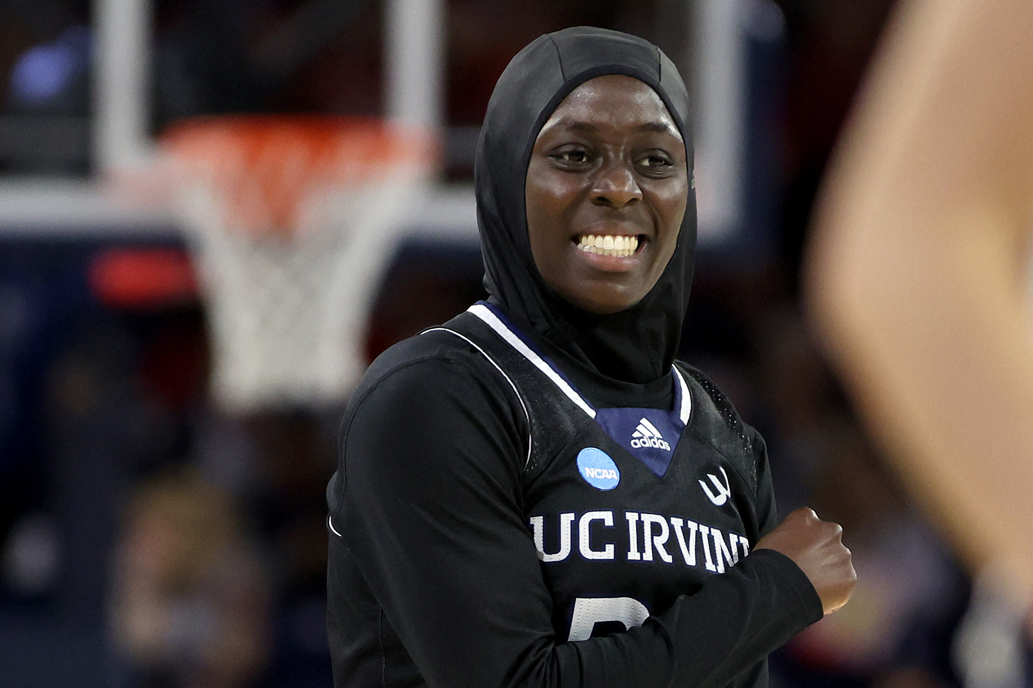 Basketball player reacts.