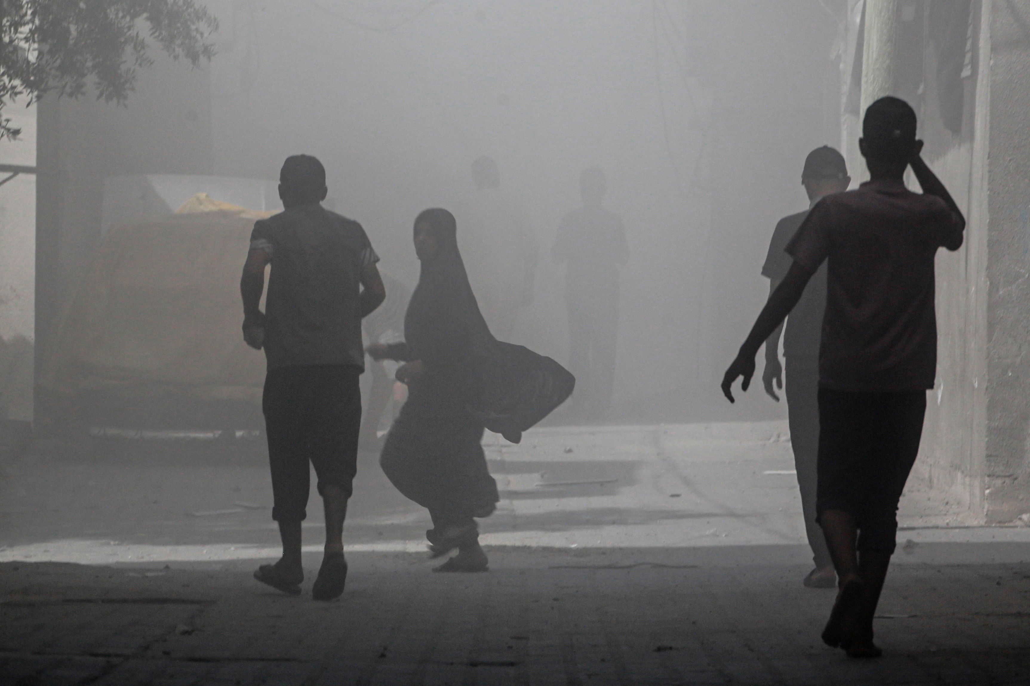 people run through dust