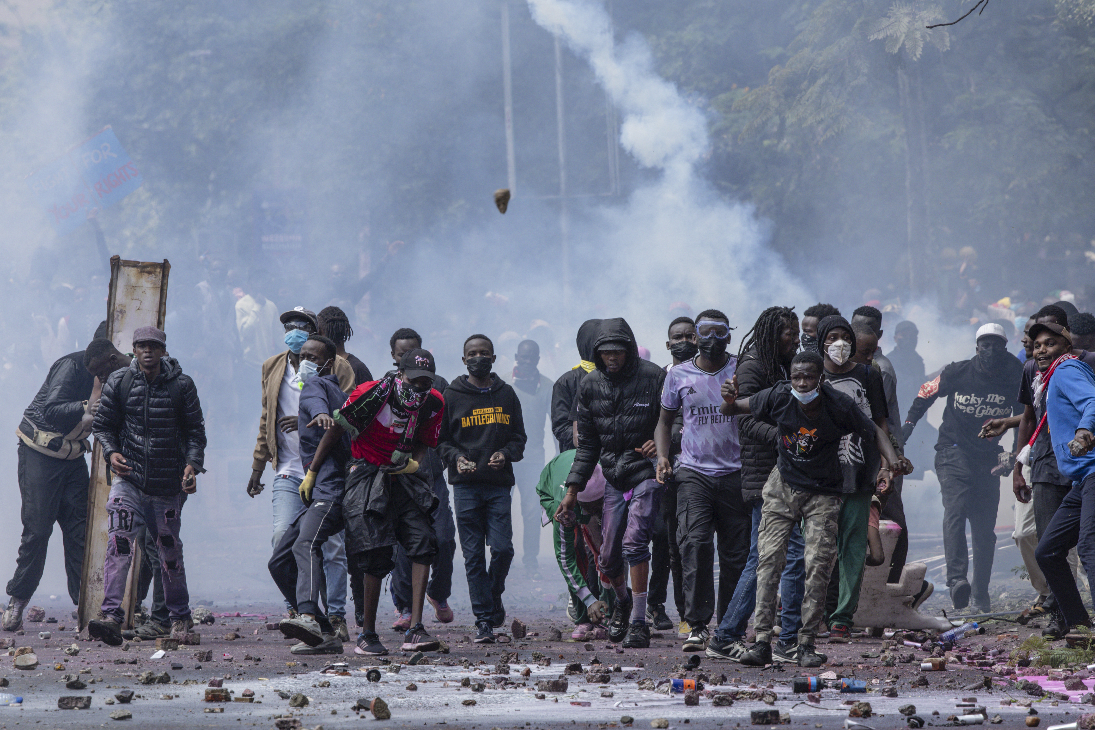 Protesters try to advance towards the police during a demonstration in Nairobi