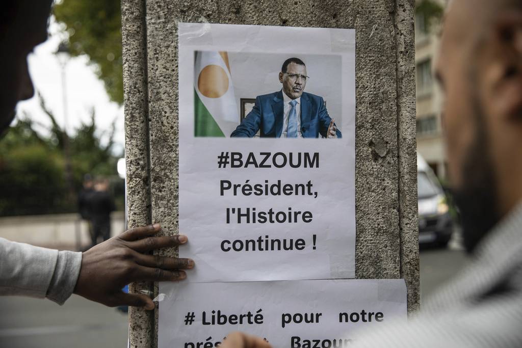 Demonstrators gather in front of the Embassy of Niger in Paris, in support of Nigerien President Mohamed Bazoum