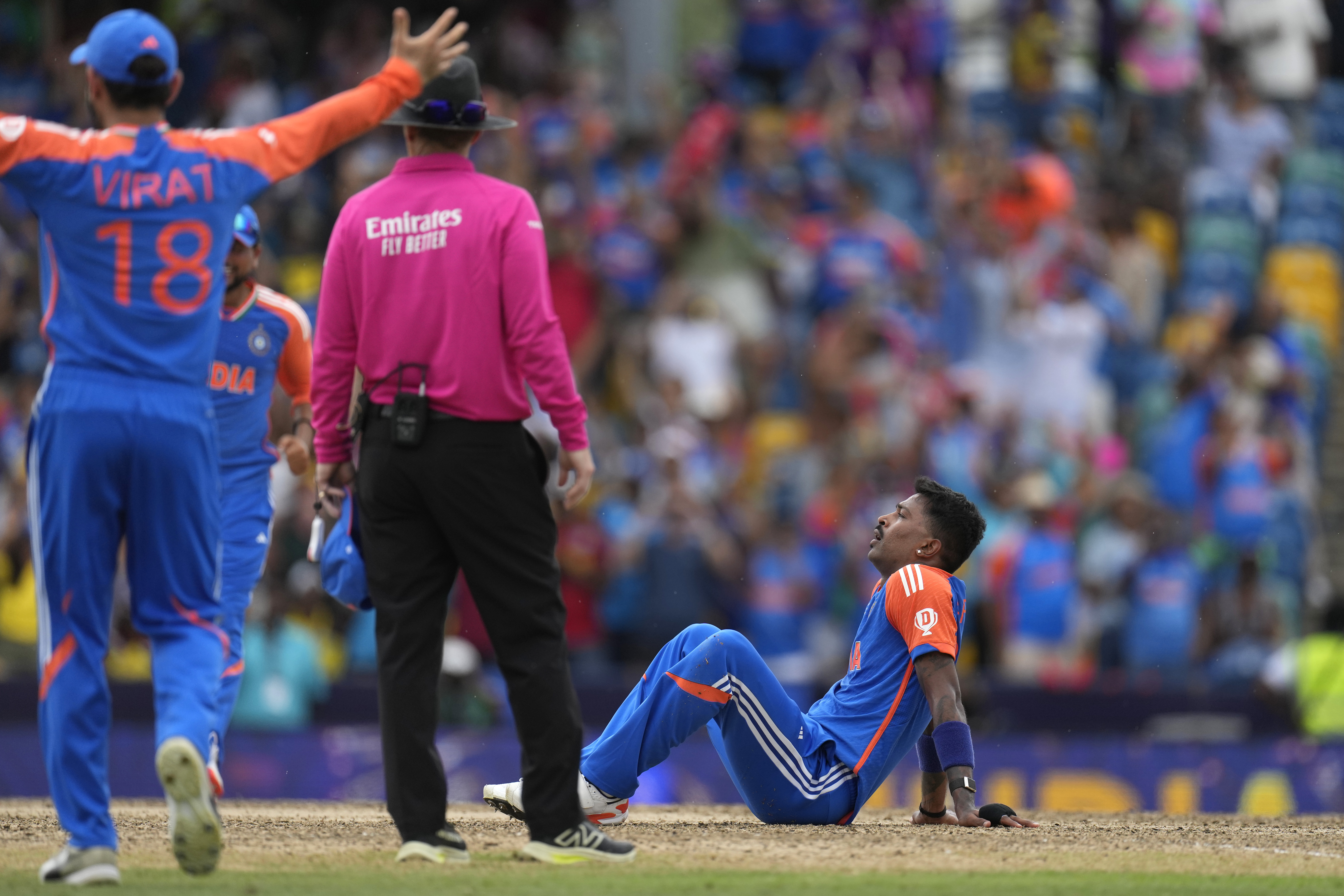 India's Hardik Pandya, right, reacts after their win against South Africa in the ICC Men's T20 World Cup final cricket match at Kensington Oval in Bridgetown, Barbados, Saturday, June 29, 2024. (AP Photo/Ricardo Mazalan)
