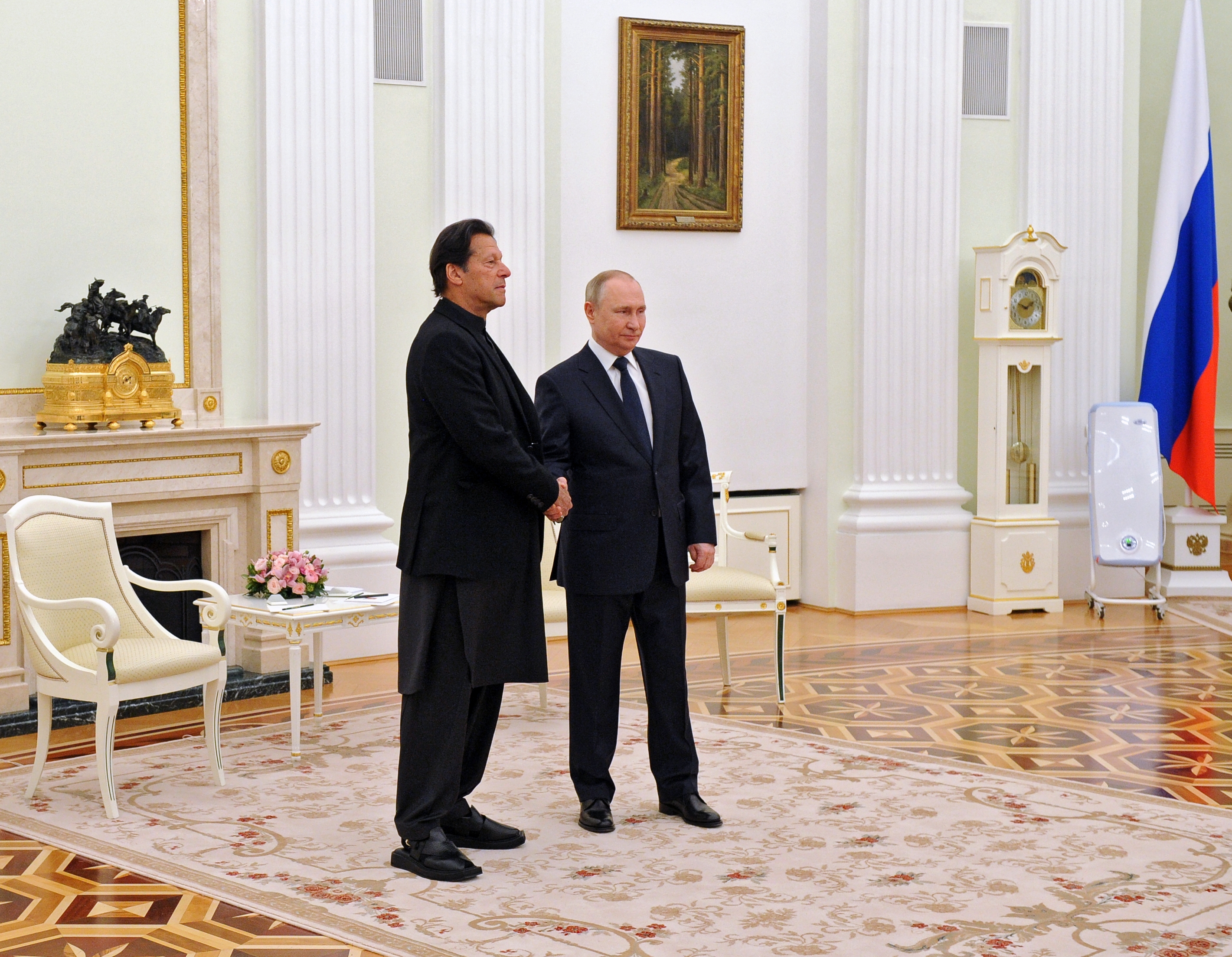 Pakistan's former premier Imran Khan met Russian president Vladimir Putin in February 2022, the day war against Ukraine began. [Mikhail Klimentyev/EPA]