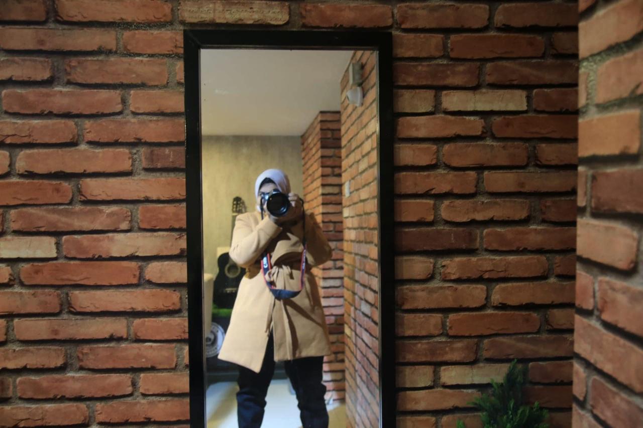 I took this photo using Mahmoud Abu Salama's Canon Camera at my favourite cafe, Ristretto, before the war. The cafe was bombed when Israel invaded Gaza City [Shahd Safi]