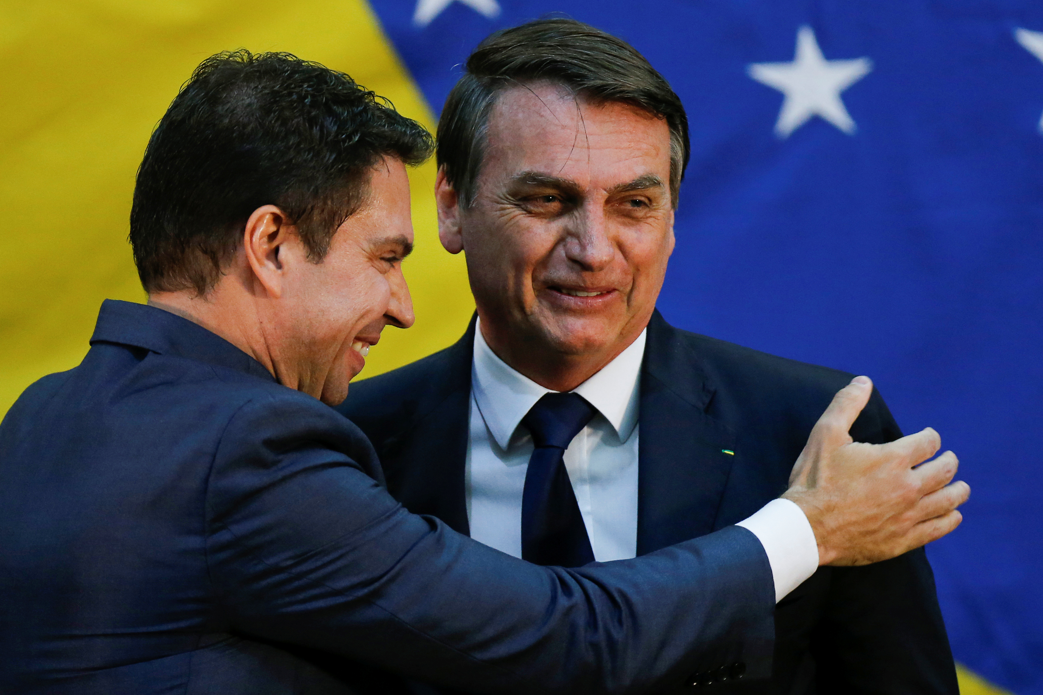 Brazil's President Jair Bolsonaro greets Alexandre Ramagem during his inauguration ceremony as the new general director of the Brazilian Intelligence Agency (ABIN) in Brasilia, Brazil