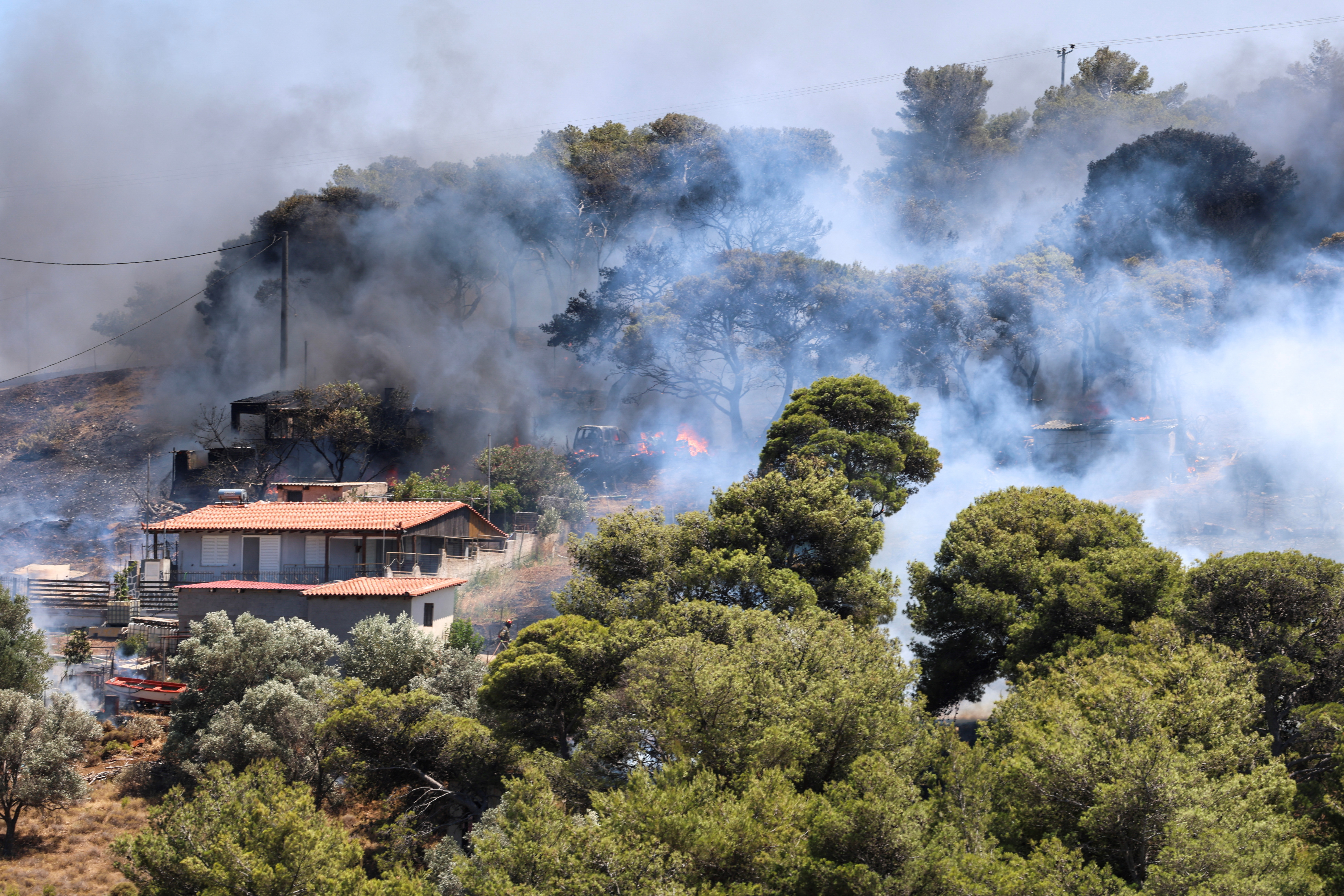 Firefighters were battling a series of wildfires near the Greek capital Athens on Sunday evening