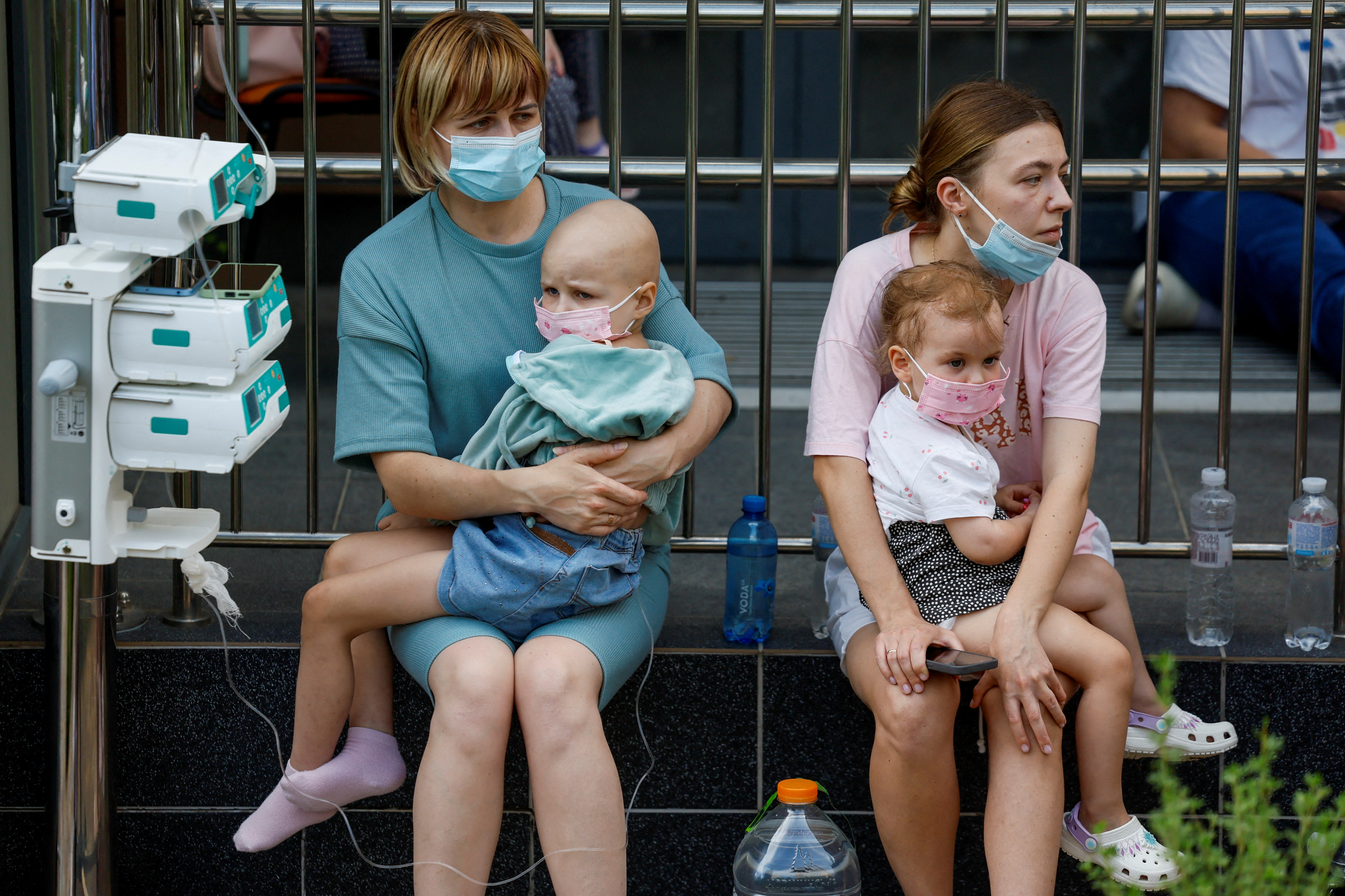 Women hold patients at Ohmatdyt Children's Hospital that was damaged during Russian missile strikes, amid Russia's attack on Ukraine, in Kyiv, Ukraine July 8, 2024. REUTERS/Gleb Garanich TPX IMAGES OF THE DAY