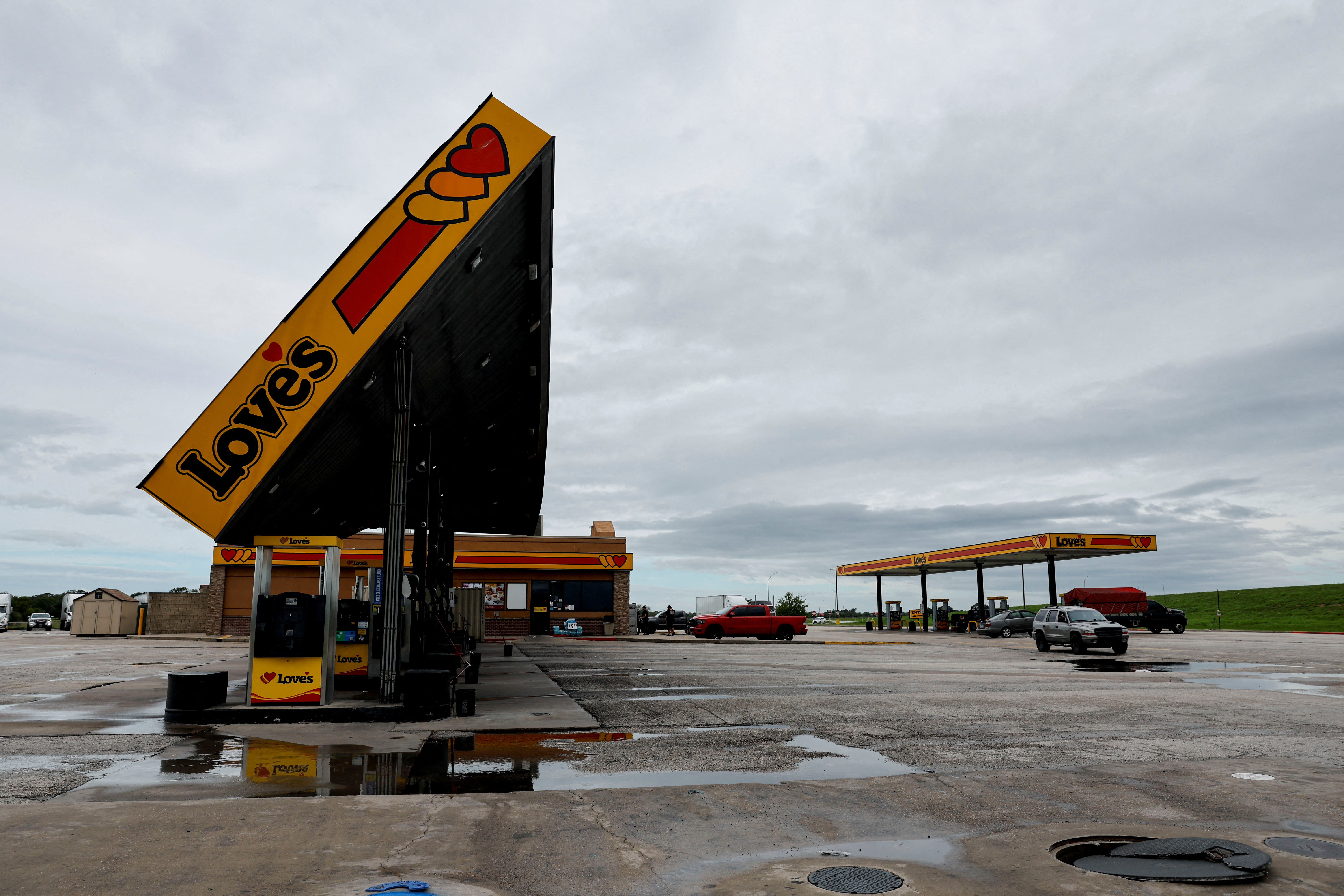 A damaged gas station roof after Beryl hit the US state of Texas