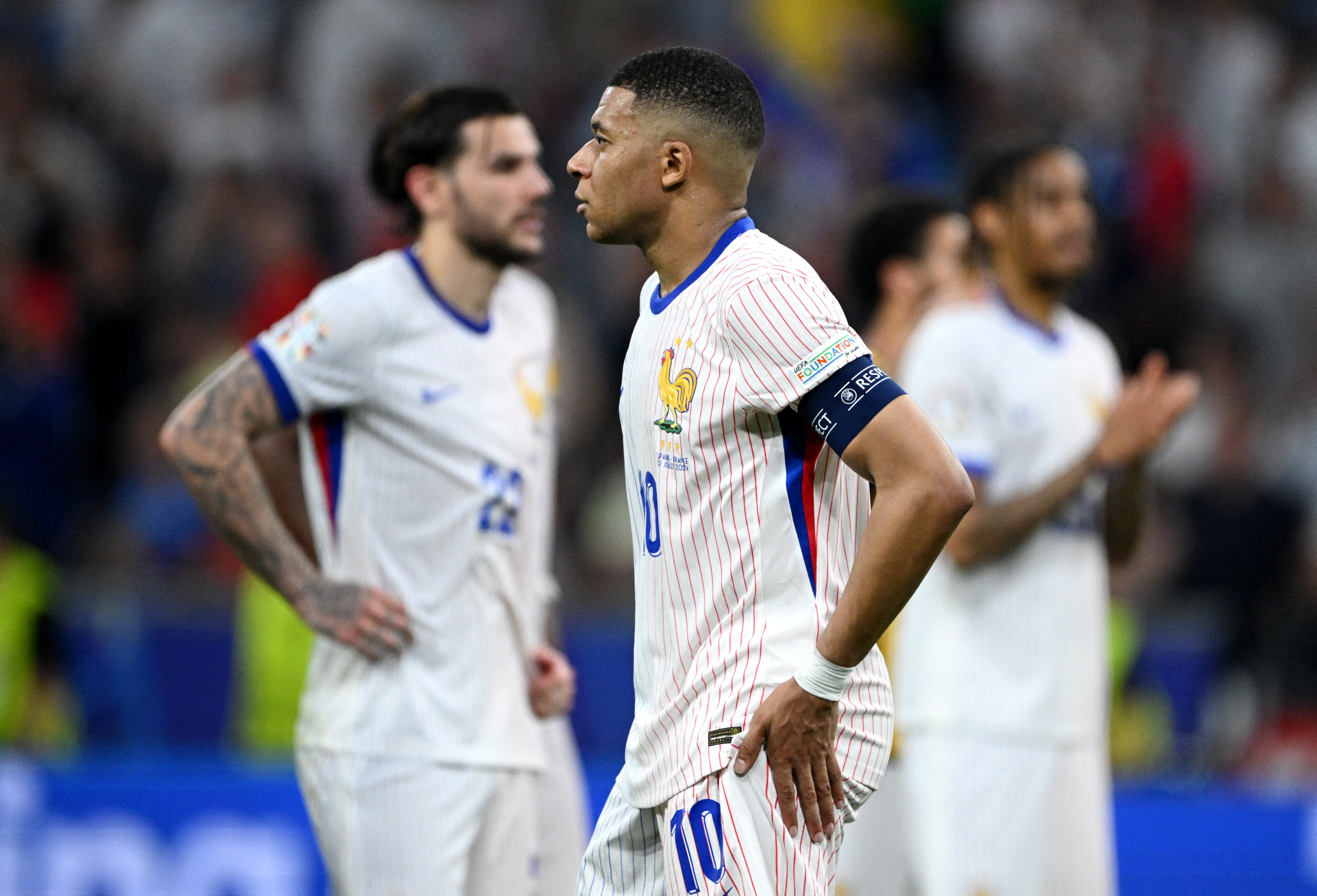 France captain Kylian Mbappe looks dejected after losing to Spain at Euro 2024 in Munich, Germany
