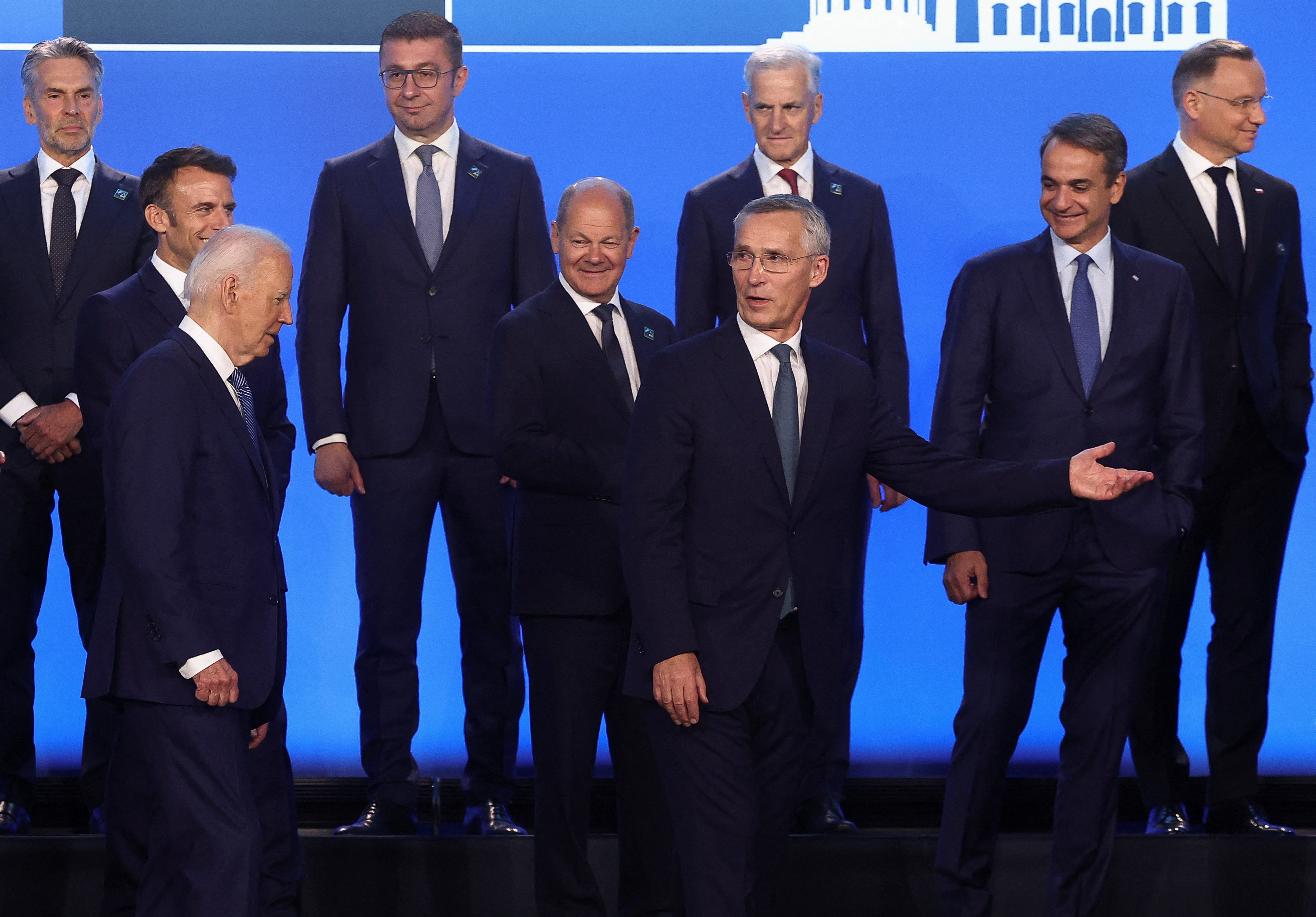 NATO Secretary General Jens Stoltenberg and U.S. President Joe Biden walk near German Chancellor Olaf Scholz, France's President Emmanuel Macron, and Greek Prime Minister Kiriakos Mitsotakis as they attend NATO's 75th anniversary summit in Washington, U.S.