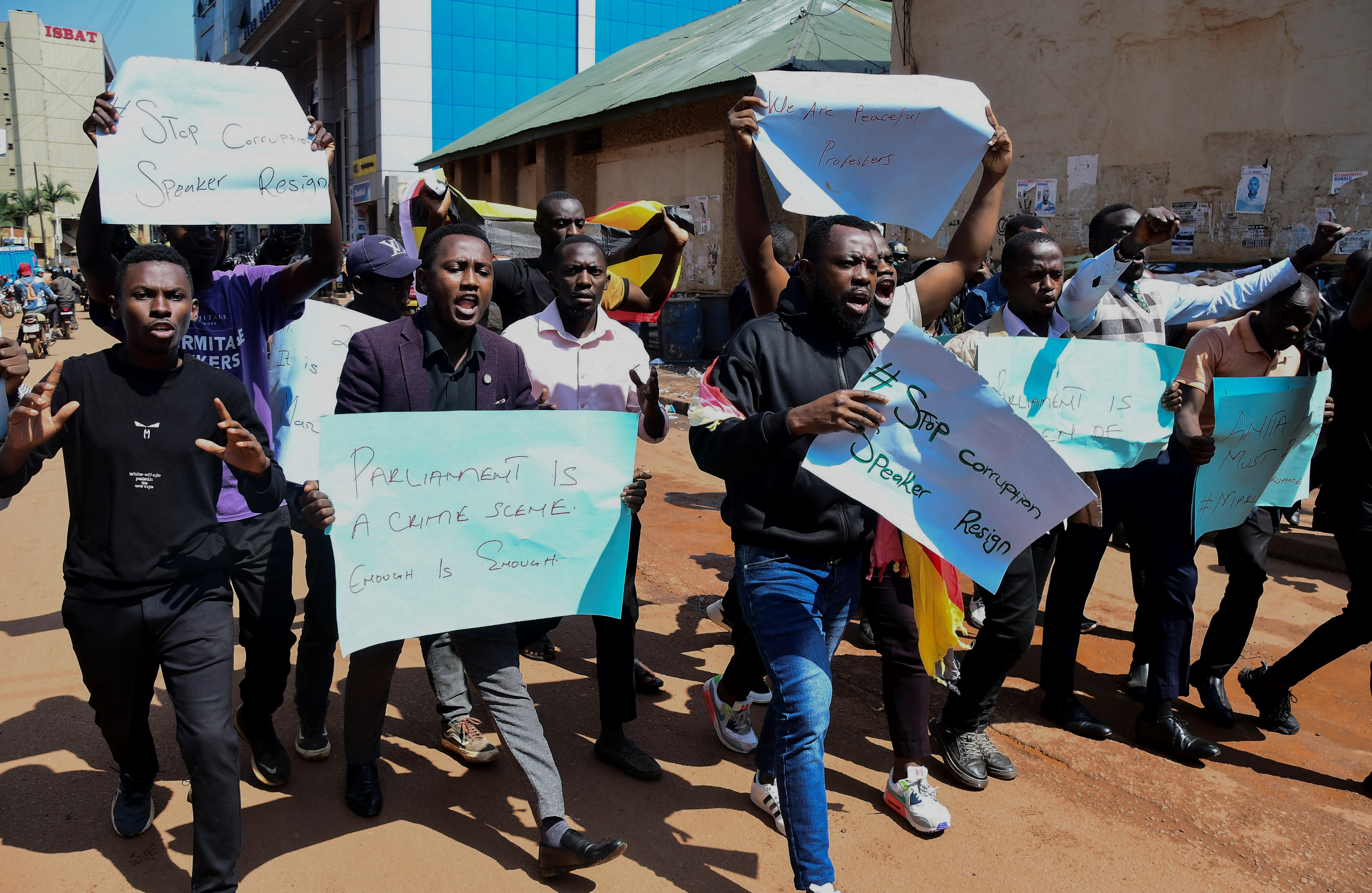 Protestors chant slogans during a rally against what they say are rampant corruption and human rights abuses by the country's rulers in Kampala, Uganda