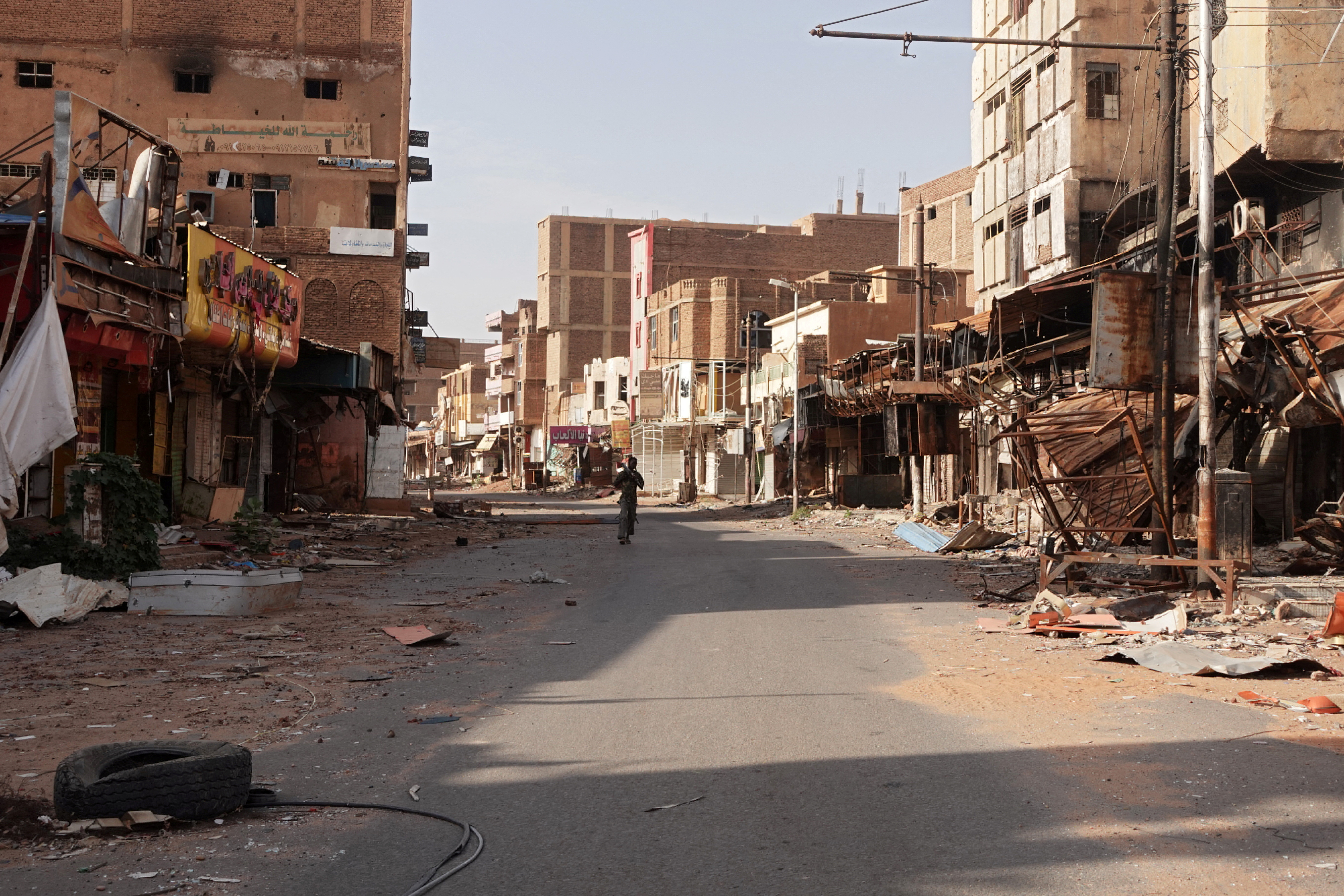 A view of a street in the city of Omdurman damaged in the year-long civil war in Sudan,