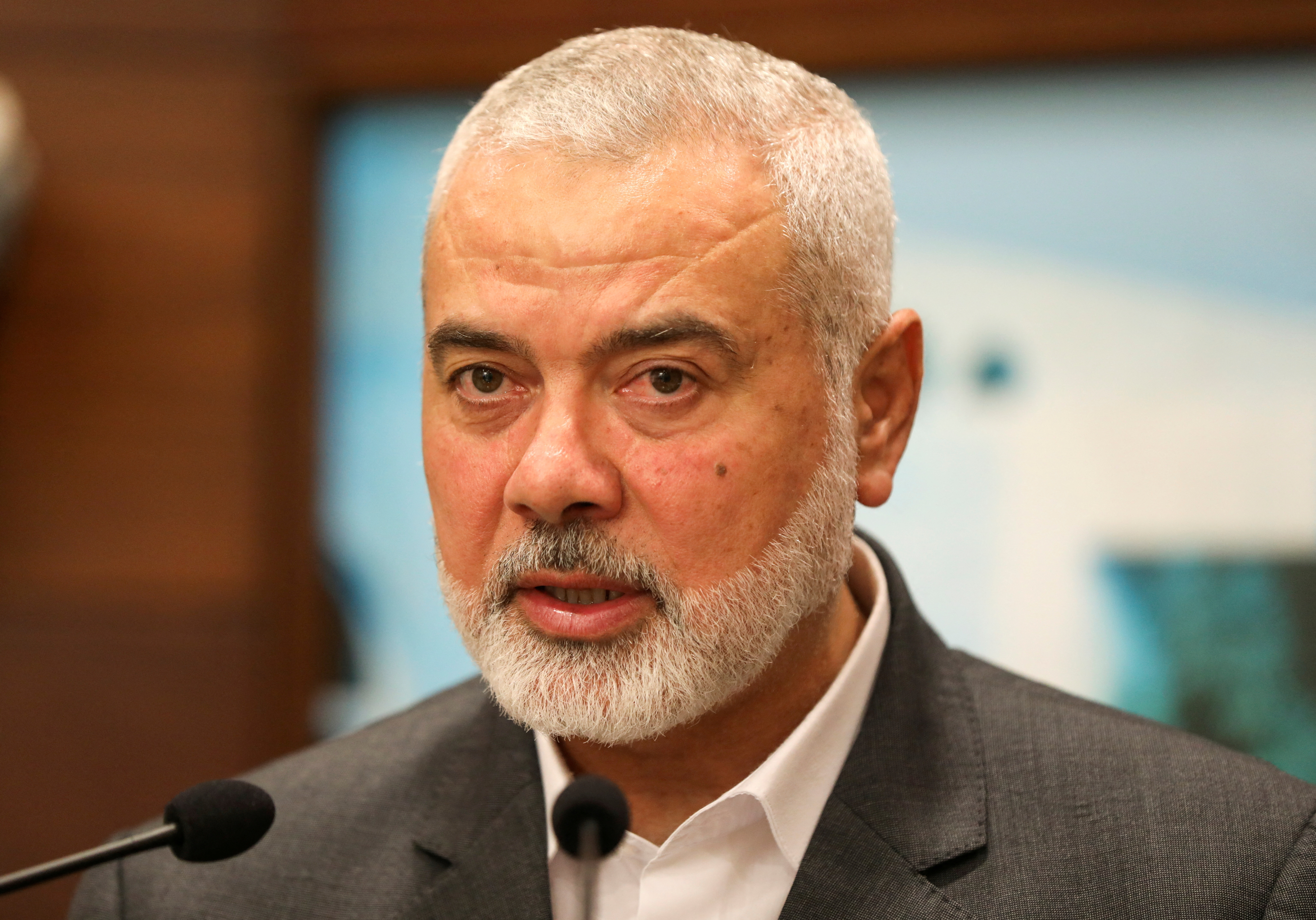 Palestinian group Hamas' top leader Ismail Haniyeh talks after meeting with Lebanon's President Michel Aoun
