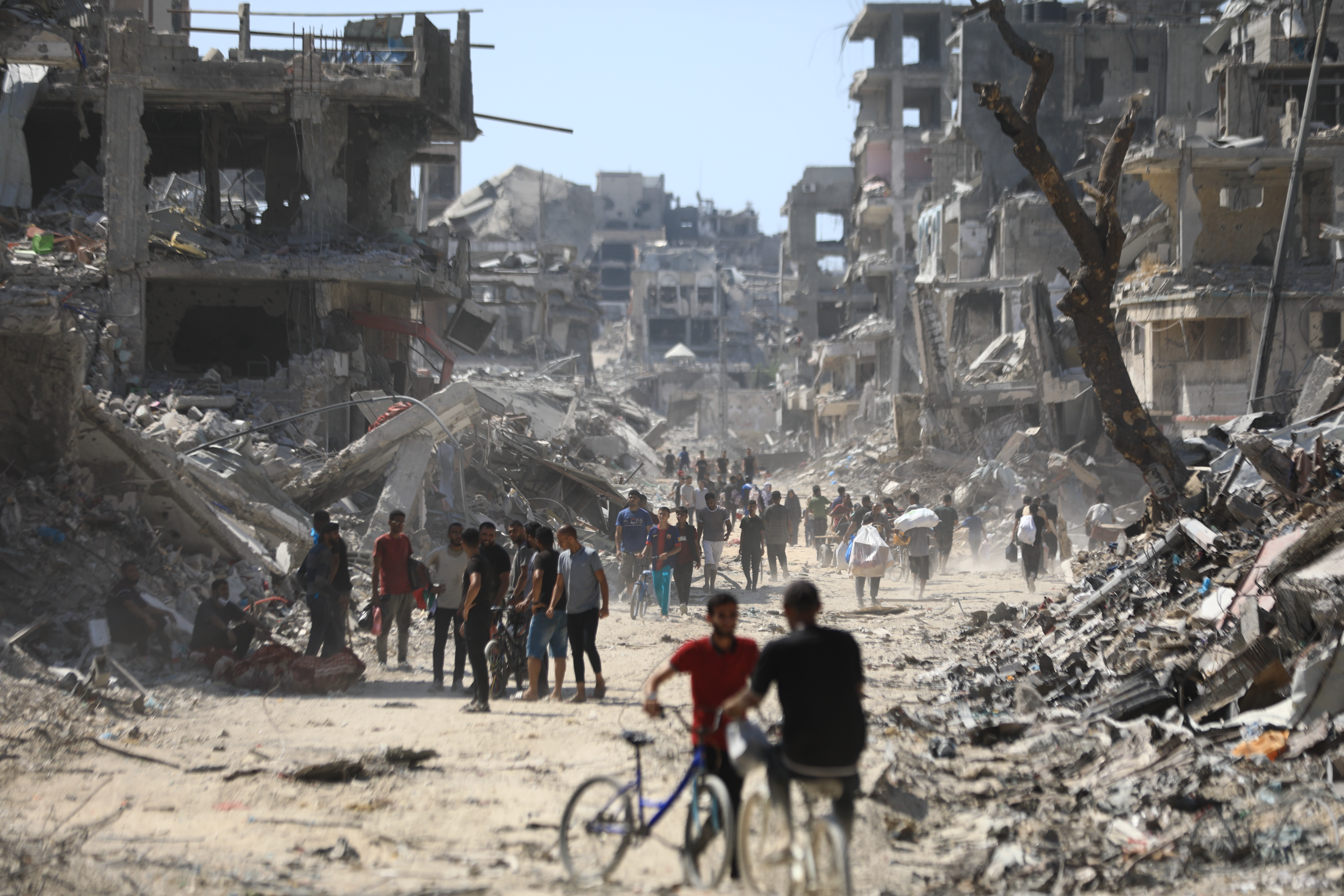 A view of great destruction as Palestinians return to their damaged neighborhoods after the withdrawal amidst inspecting the wreckage, following the Israeli army's withdrawal from the Shuja'iyya neighborhood in eastern Gaza City