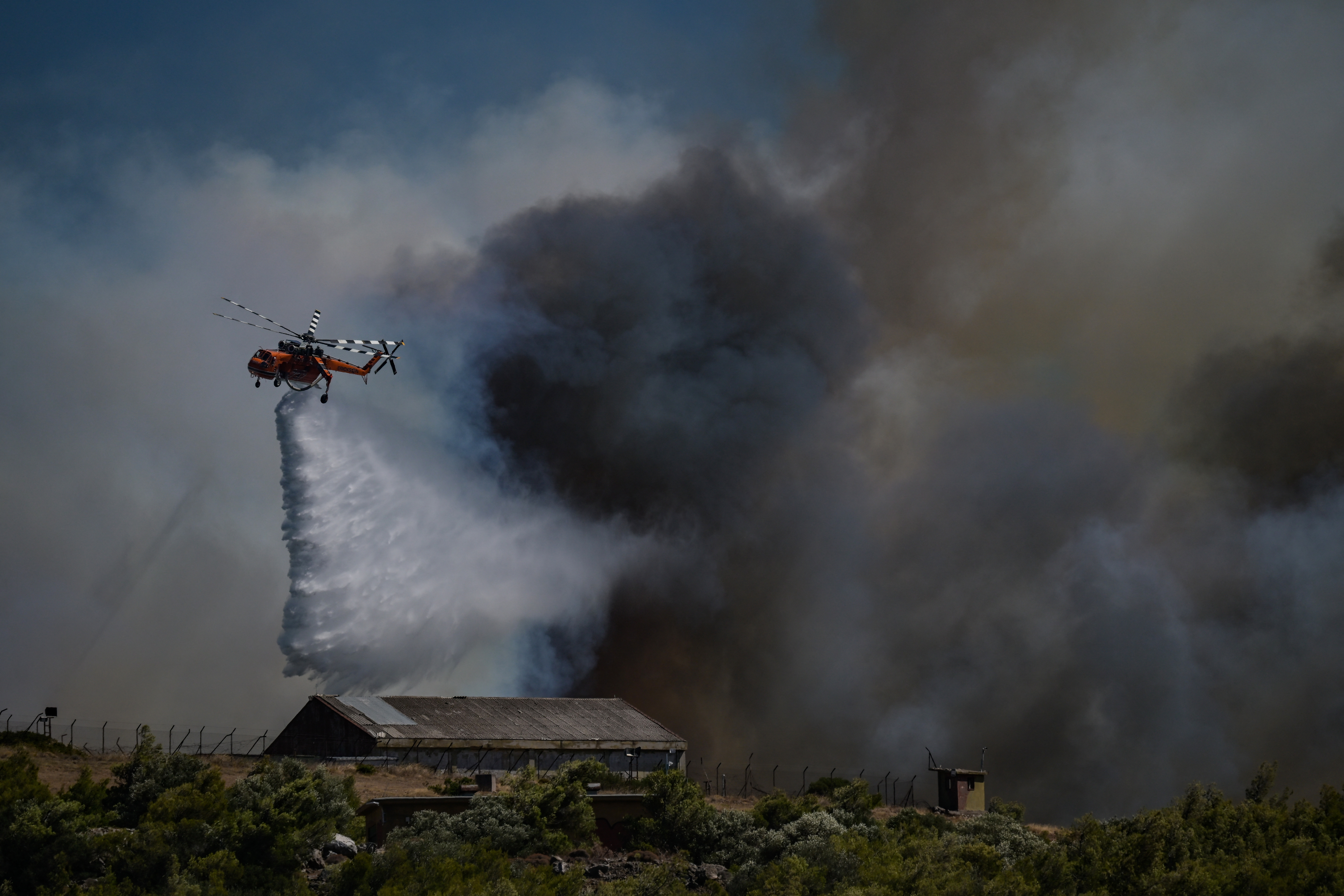 Firefighters were battling a series of wildfires near the Greek capital Athens on Sunday evening