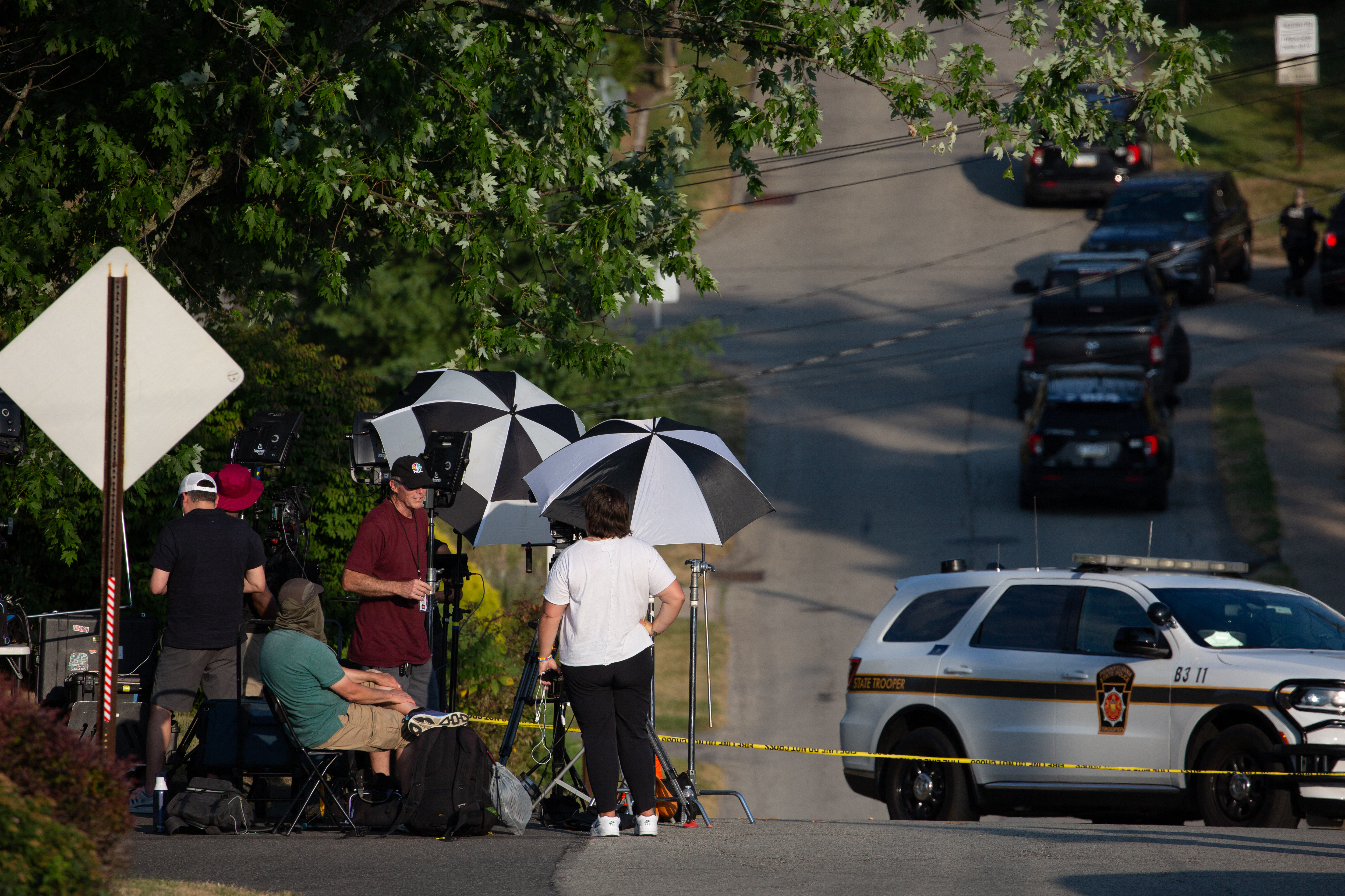Members of the media set up in the neighborhood around suspect Thomas Matthew Crooks's home as the FBI continues its investigation