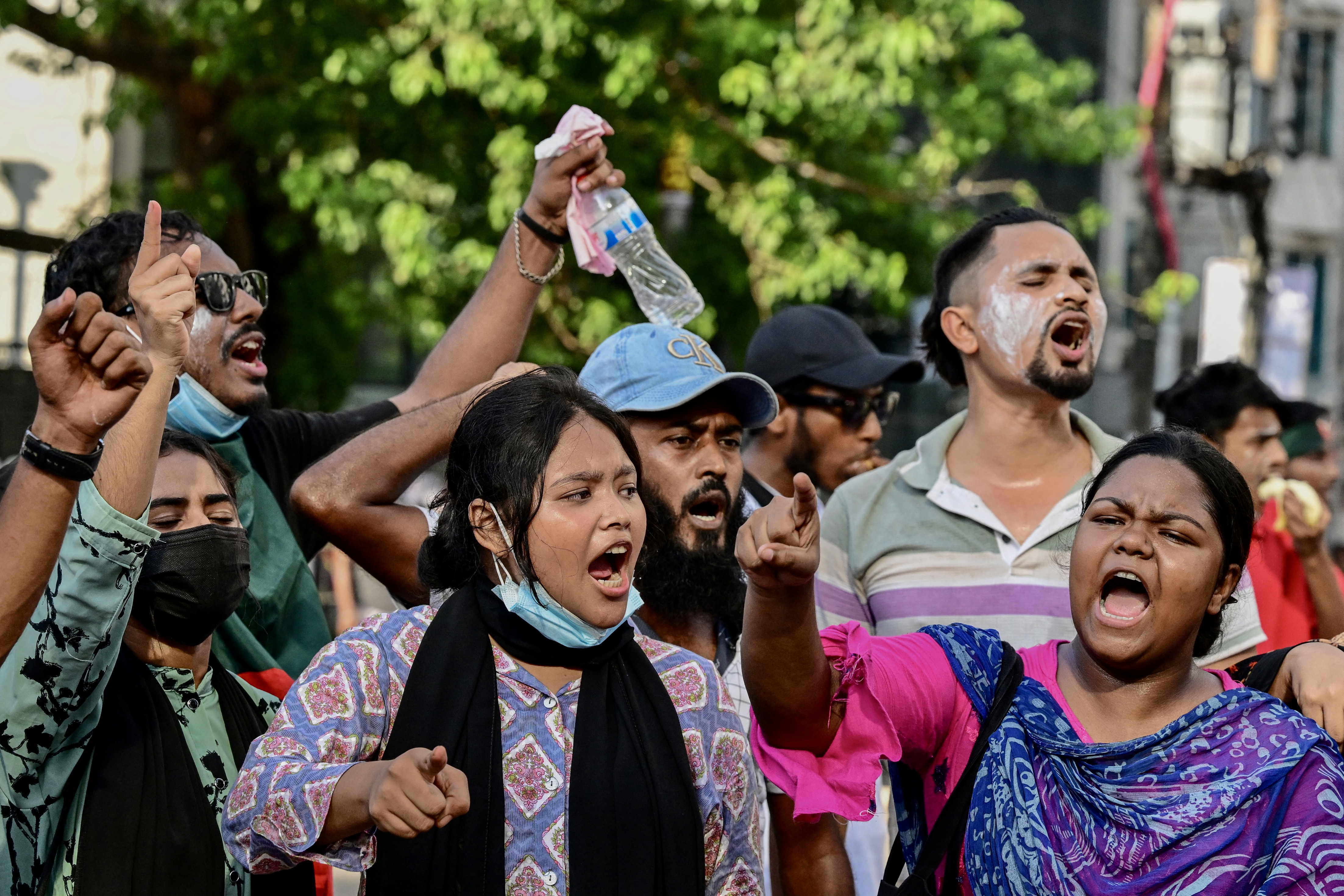 Students shout slogans during ongoing anti-quota protest in Dhaka on July 18, 2024. - Bangladeshi students pressed on July 18 with nationwide protests against civil service hiring rules, rebuffing an olive branch from Prime Minister Sheikh Hasina