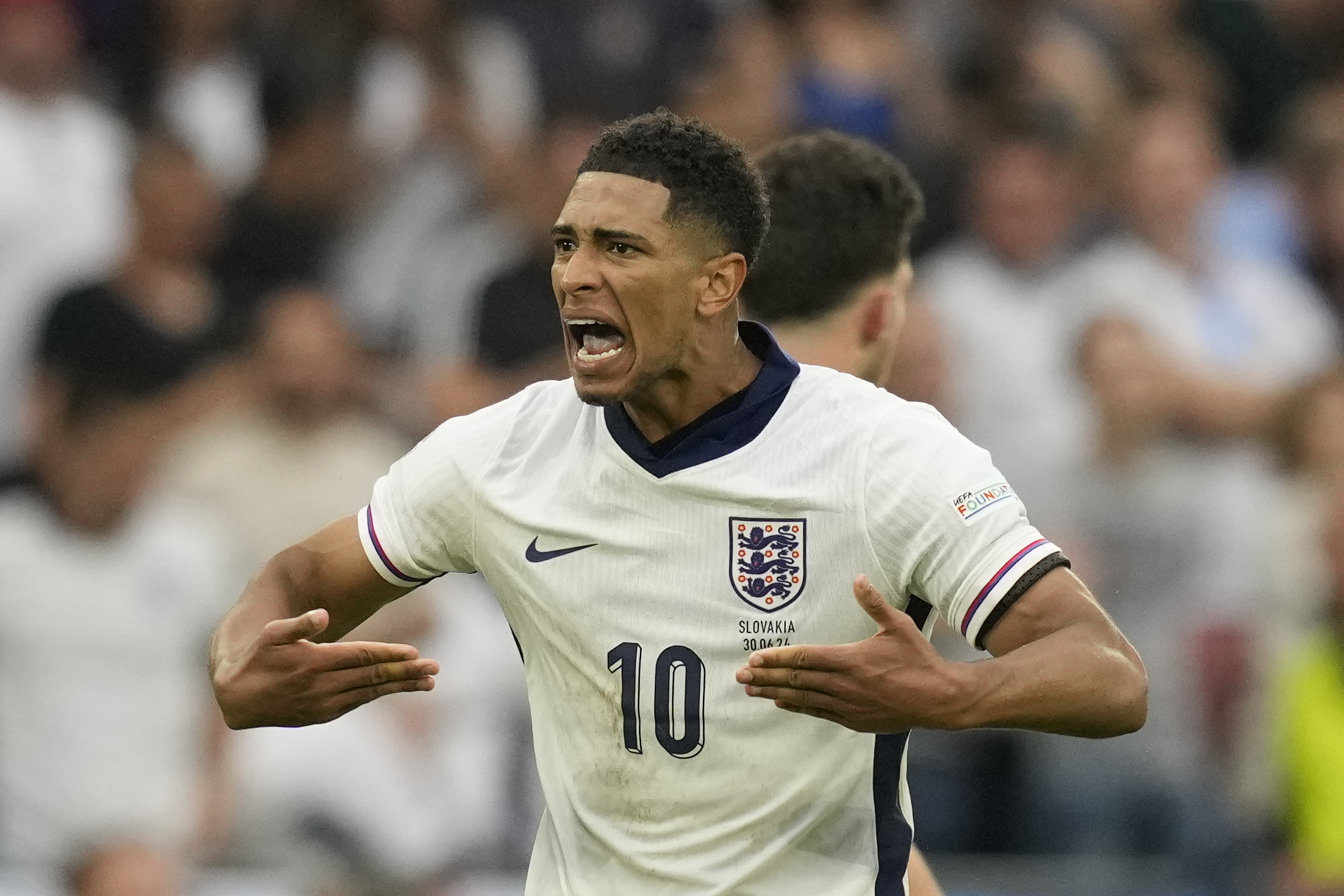 Football player celebrates goal.