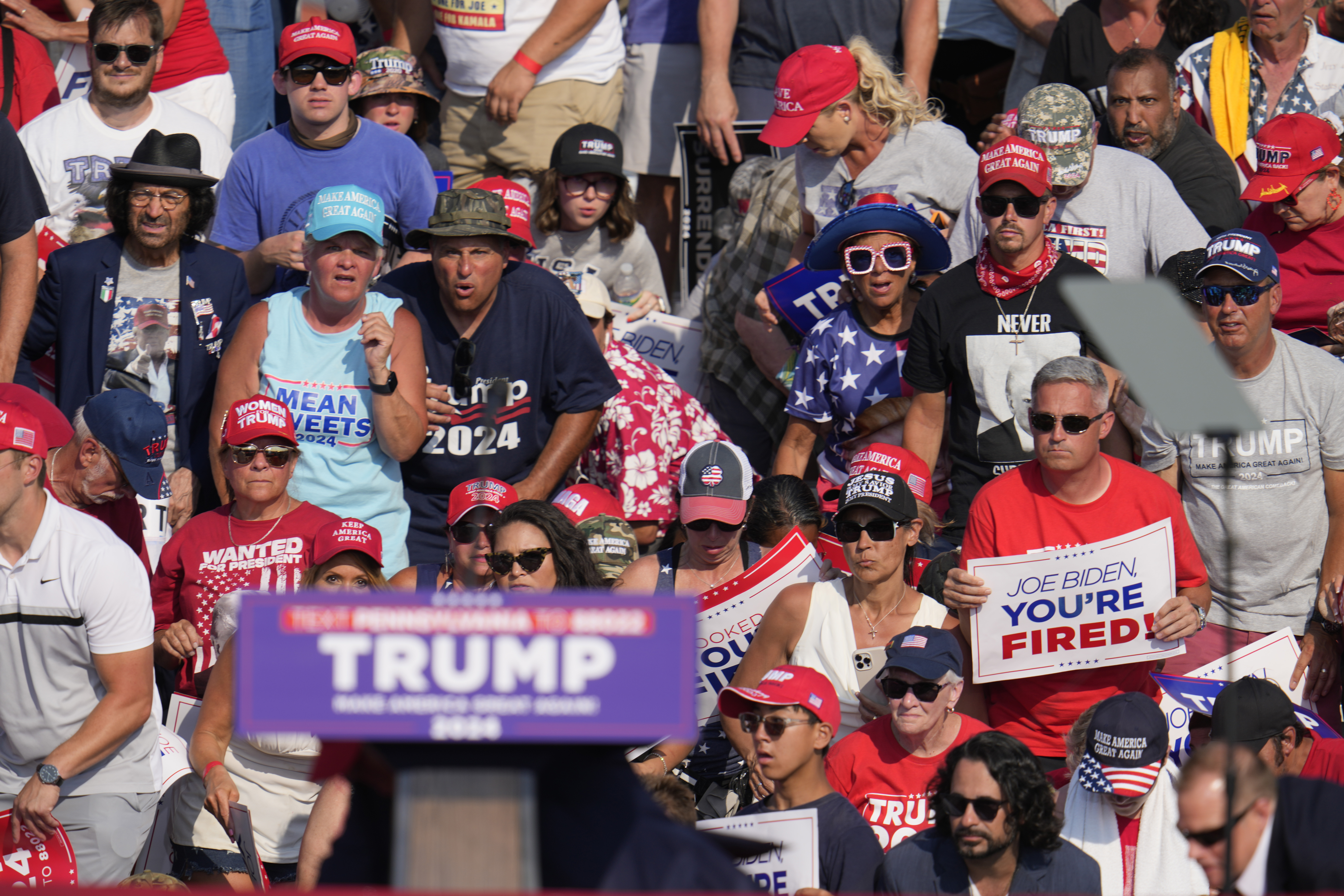 Bloodied Trump survives assassination bid