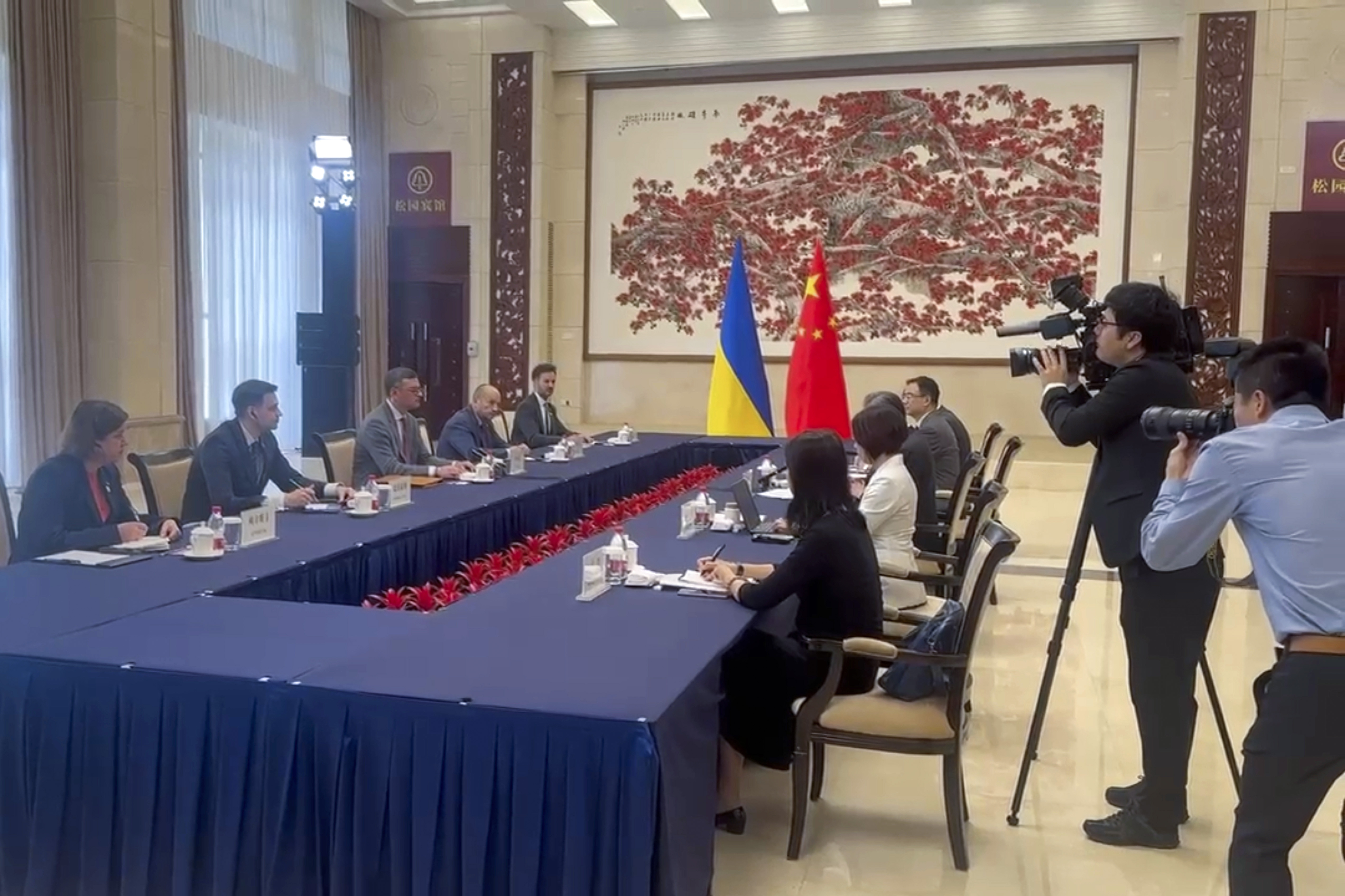 kraine's Foreign Ministry Dmytro Kuleba, third from left holds talks with China's Foreign Minister Wang Yi 