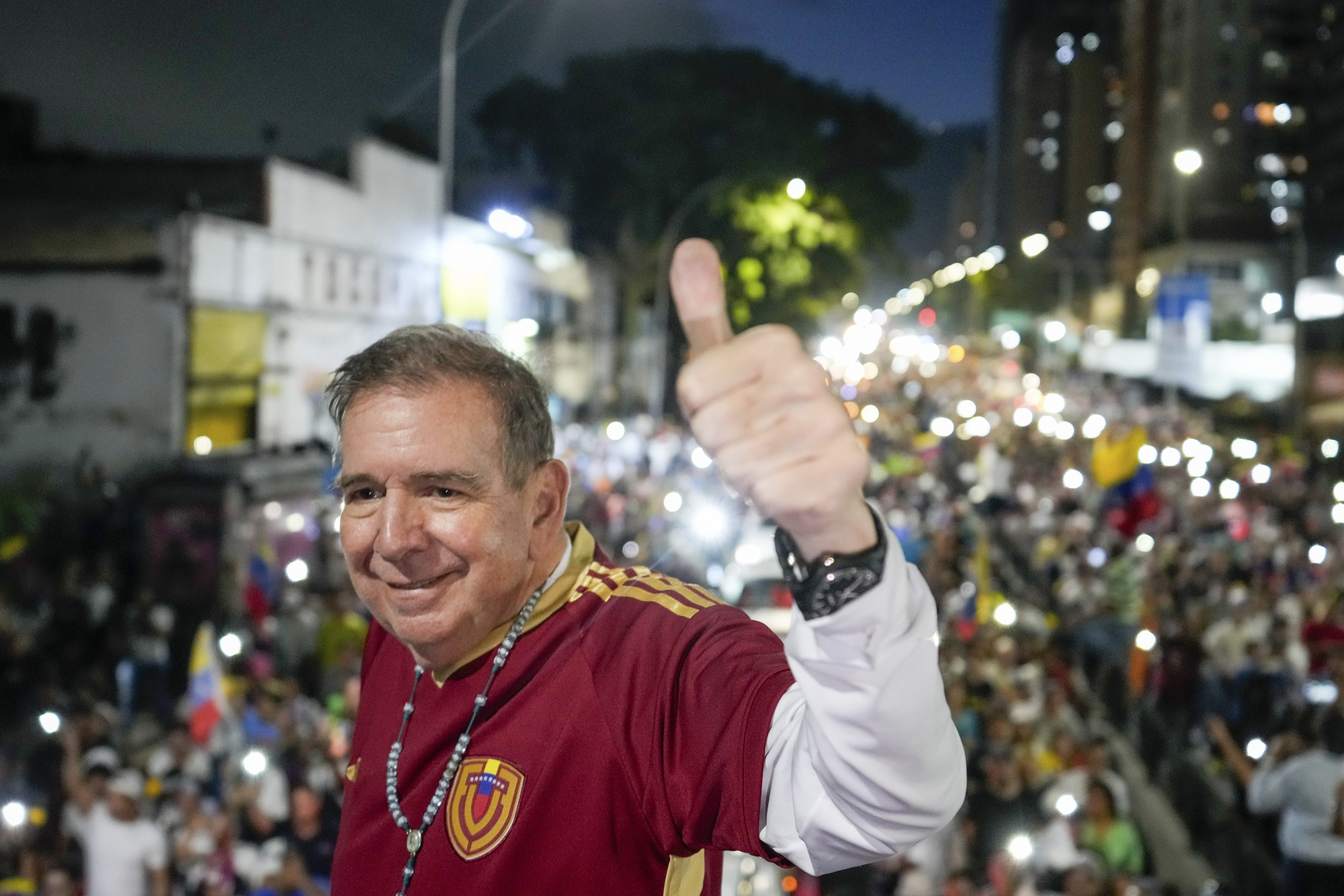 Opposition presidential candidate Edmundo Gonzalez flashes a thumbs up during a rally launching the official presidential campaign