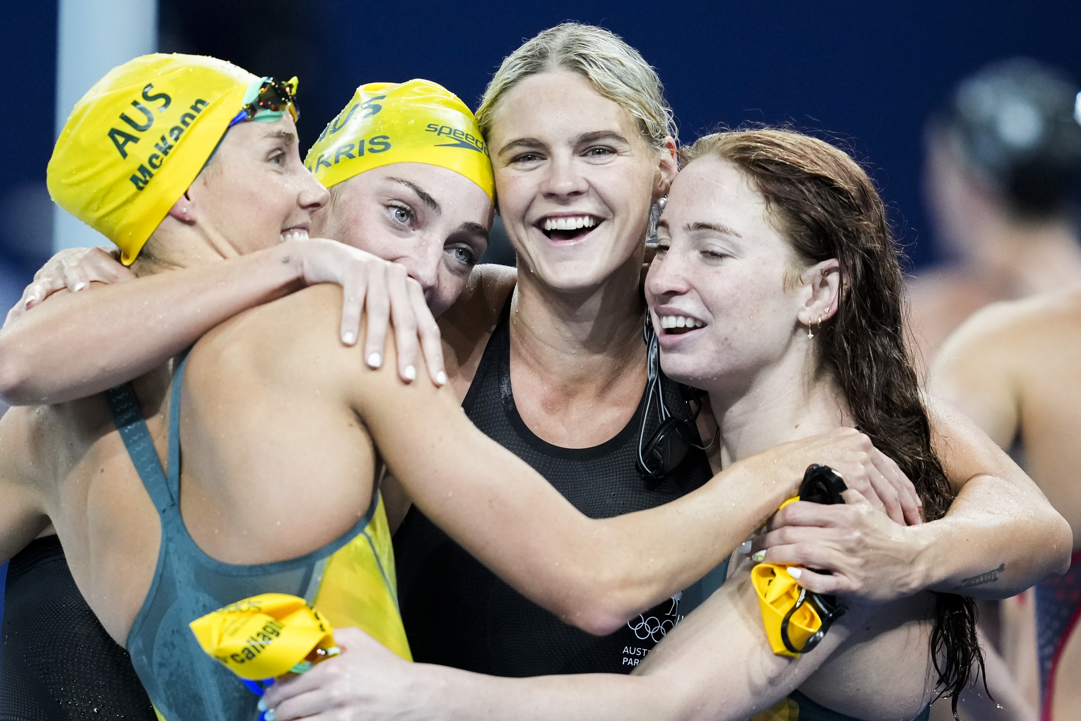 From left to right: Emma Mckeon, Meg Harris, Shayna Jack and Mollie O'Callaghan of Australia, celebrate after winning the women's 4x100-meter freestyle final at the 2024 Summer Olympics, Saturday, July 27, 2024, in Nanterre, France. (AP Photo/Ashley Landis)
