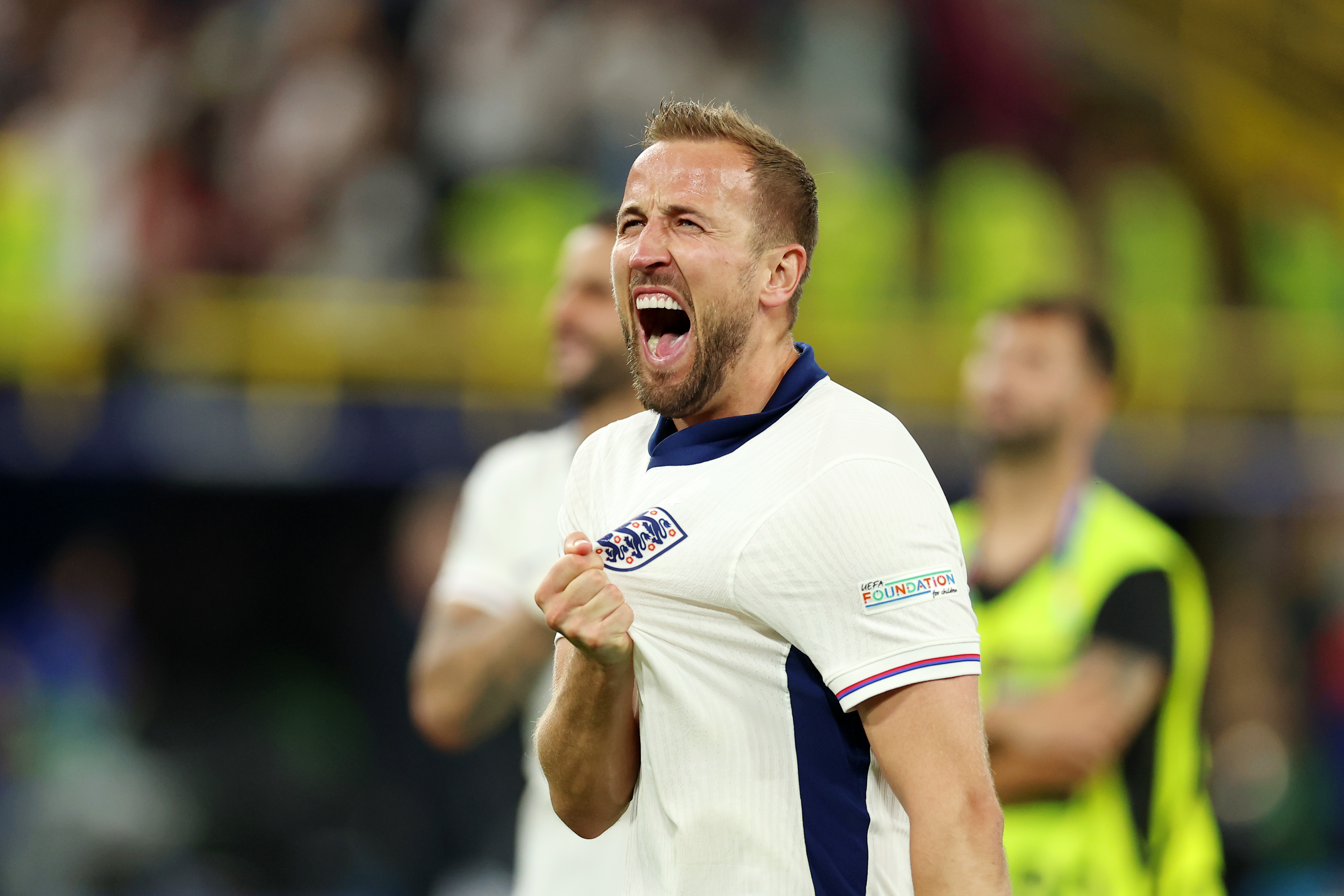 Footballer celebrates victory.