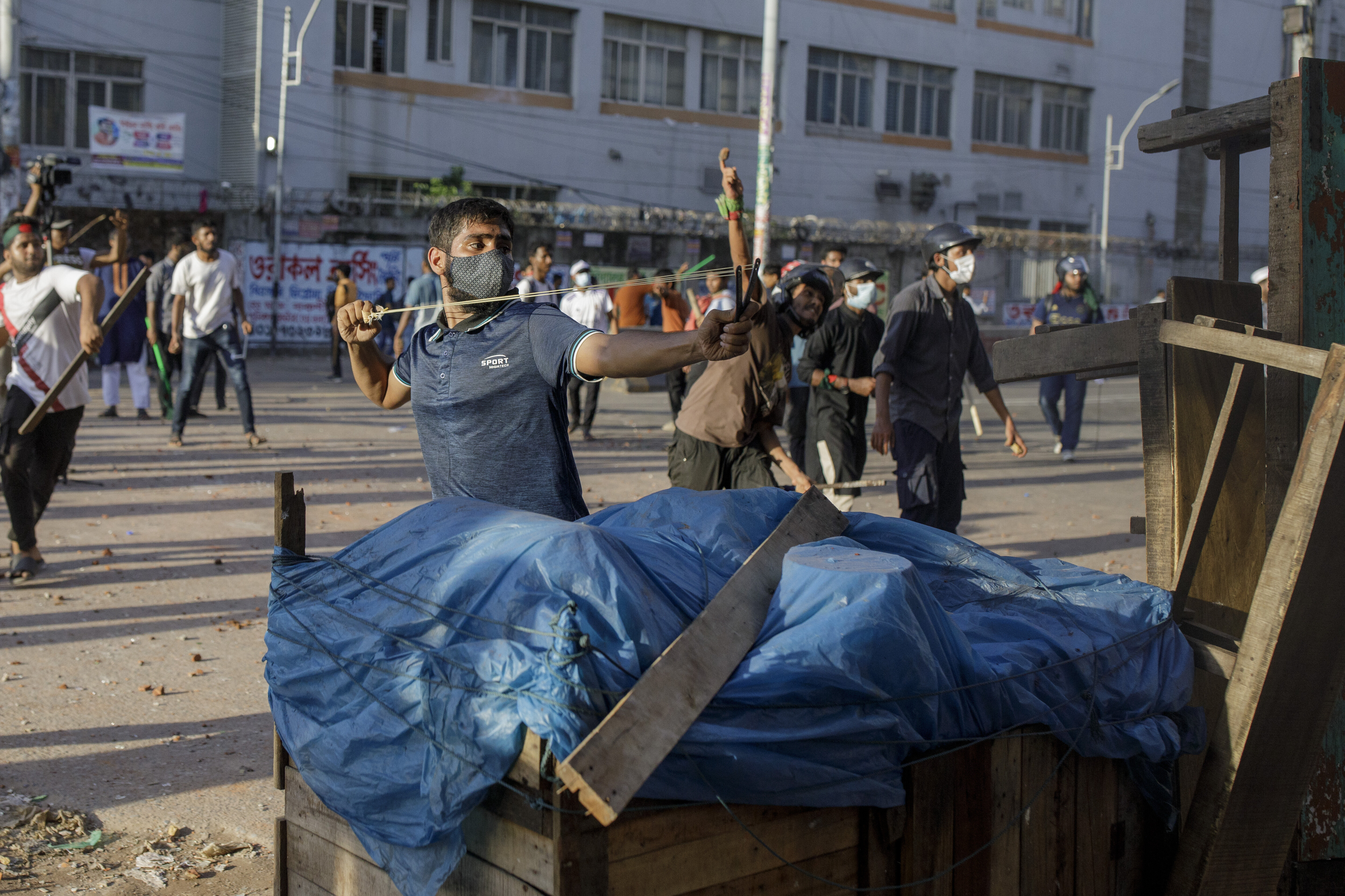 Bangladesh shuts schools and universities after six killed in protests