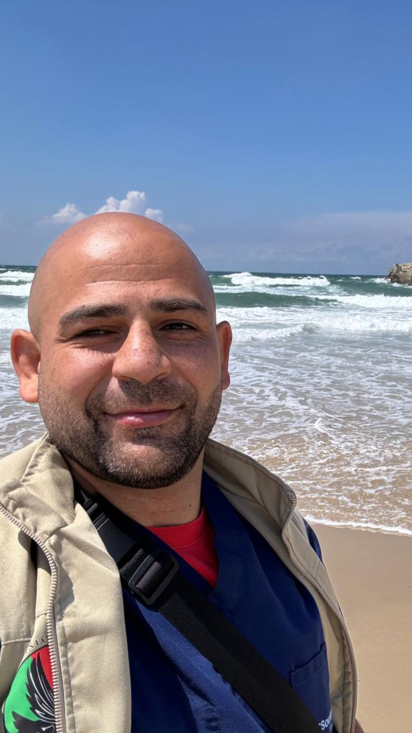 Omar Sabha takes a selfie on the sandy shores of the Mediterranean Sea