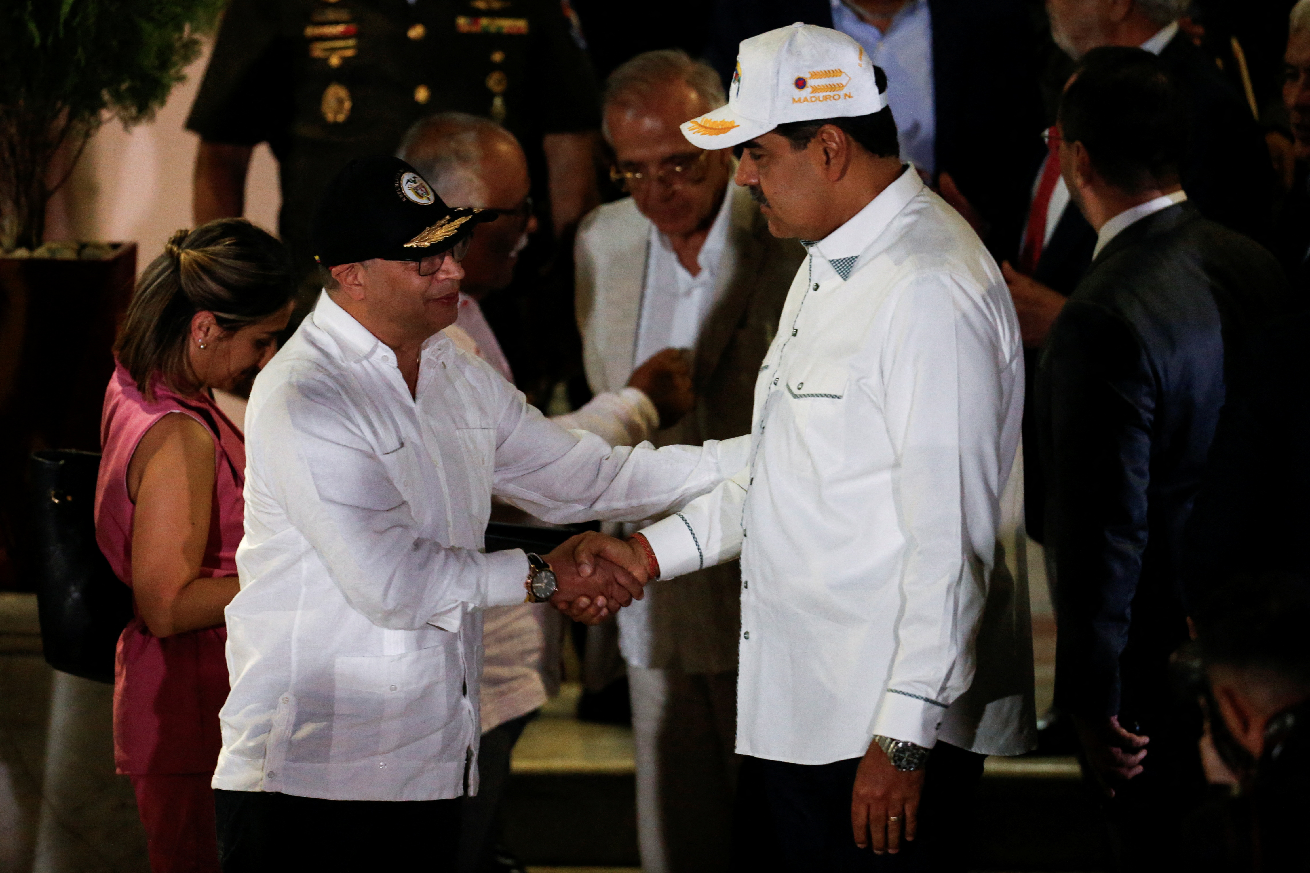 Colombian President Gustavo Petro shakes hands with his Venezuelan counterpart Nicolas Maduro